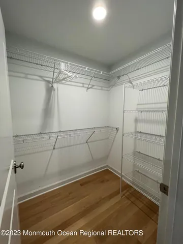 a view of a room with racks on the wall