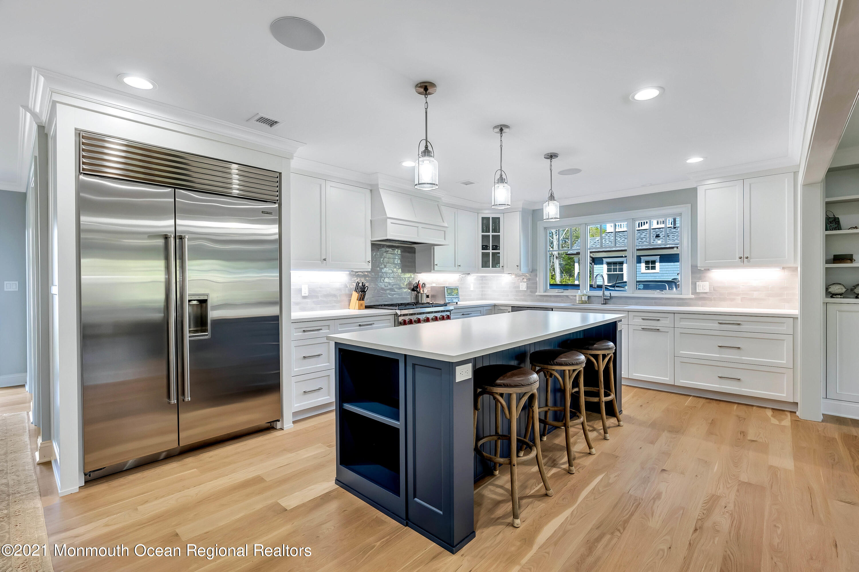 211 Monroe Avenue Spring Lake, NJ 07762 - Photo 10 of 46 a kitchen with granite countertop a sink appliances and cabinets