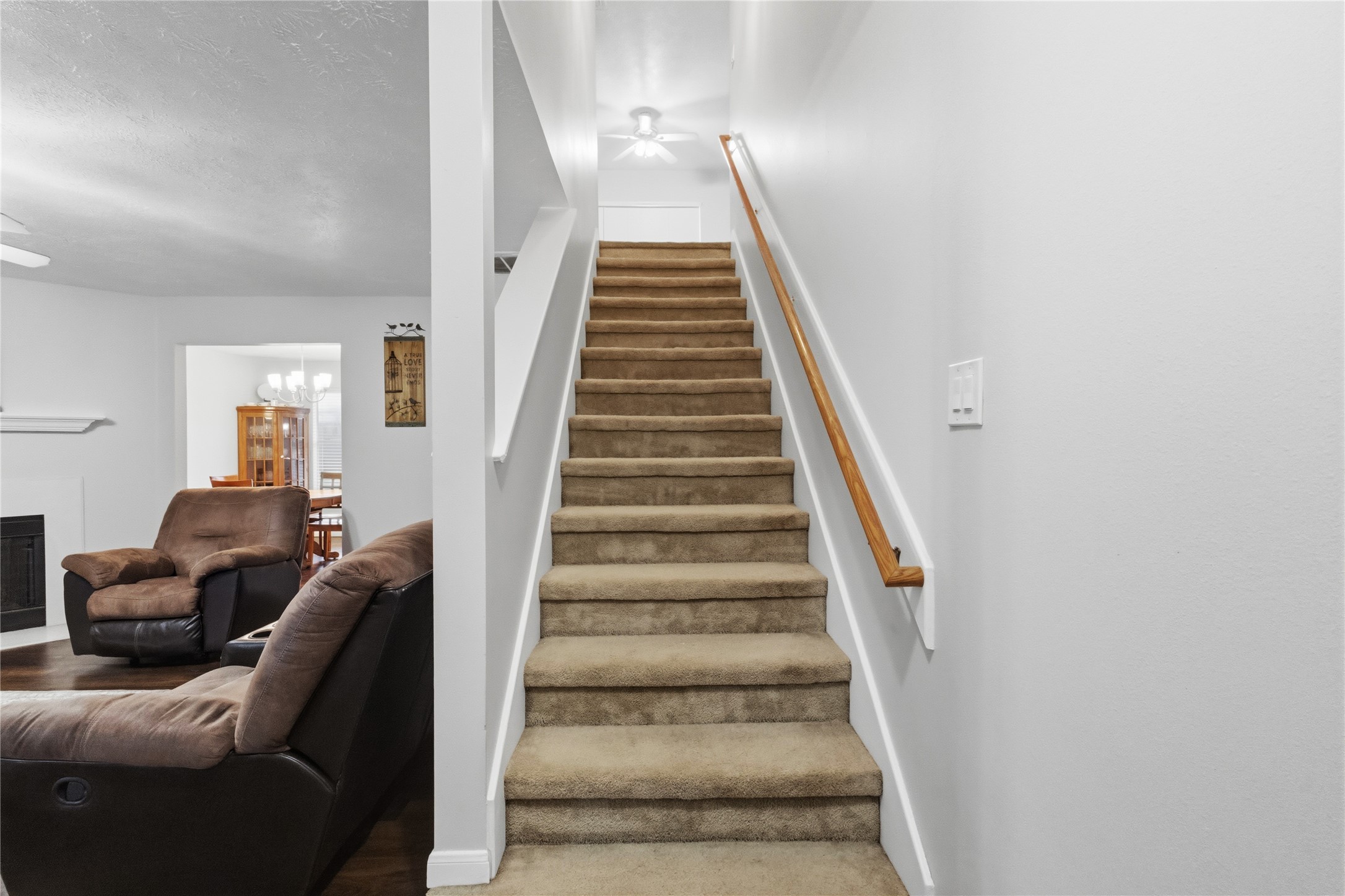 2703 Hidden Spring Vale Drive Spring, TX 77386 - Photo 6 of 29 The stairwell at the entrance of the home provides a graceful ascend to the second floor game room landing.