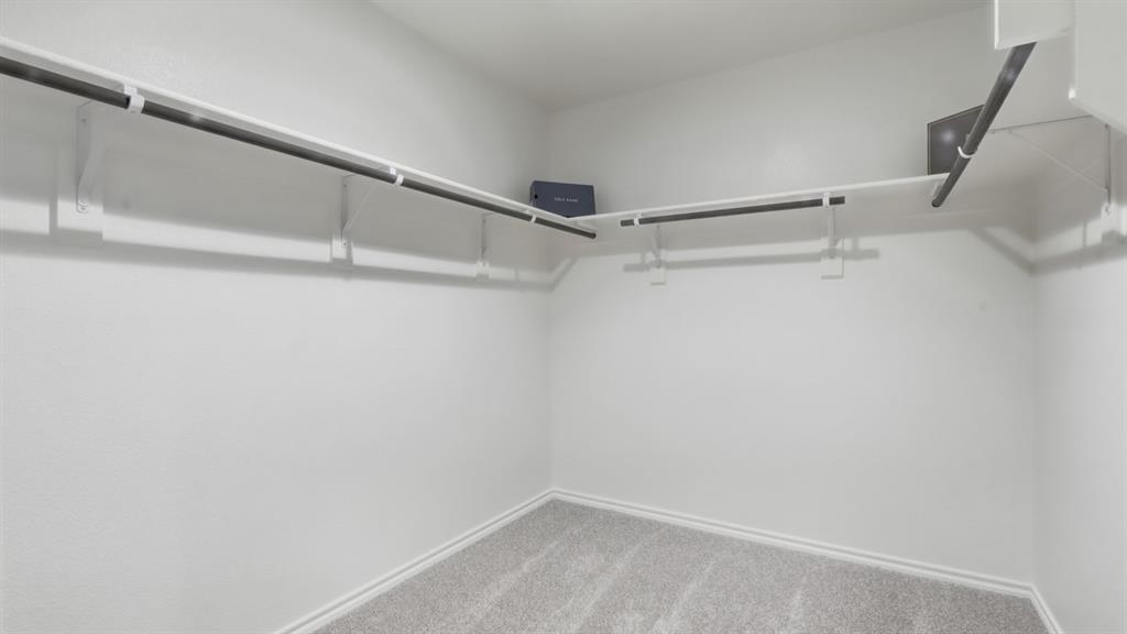 2820 Hawk Drive Denton, TX 76205 - Photo 10 of 30 a view of a room with racks on the wall