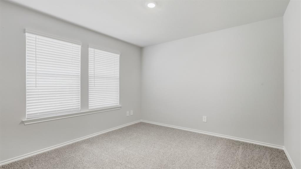 2820 Hawk Drive Denton, TX 76205 - Photo 15 of 30 an empty room with a window