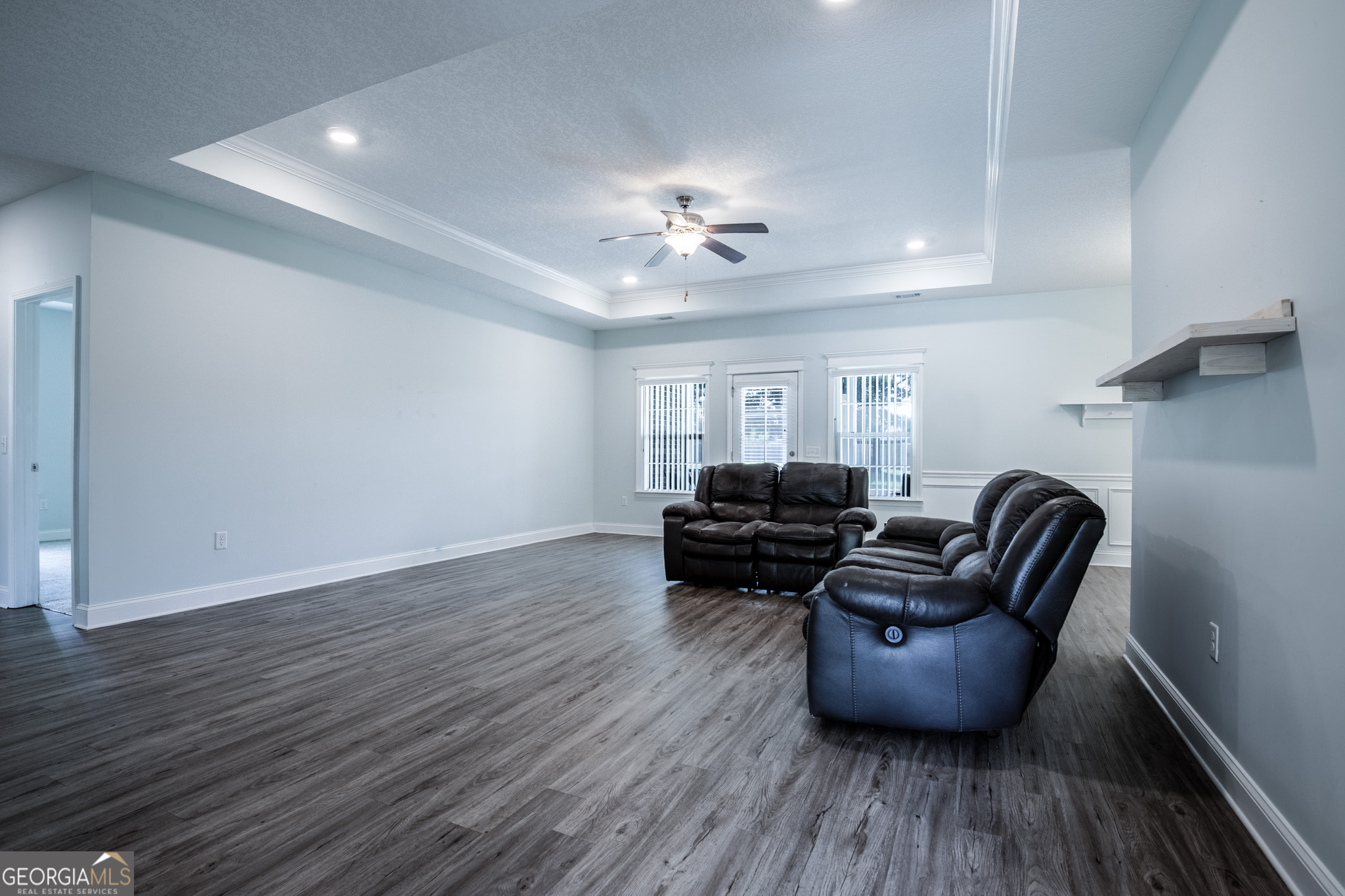 3453 John Wells Road Ludowici, GA 31316 - Photo 11 of 51 a living room with furniture and a ceiling fan