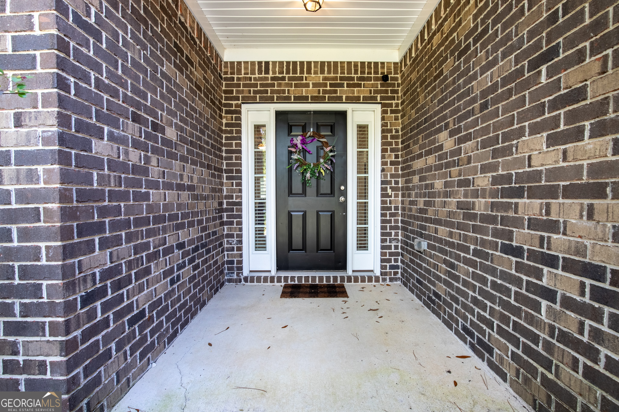 3453 John Wells Road Ludowici, GA 31316 - Photo 13 of 51 a front view of a house with a door
