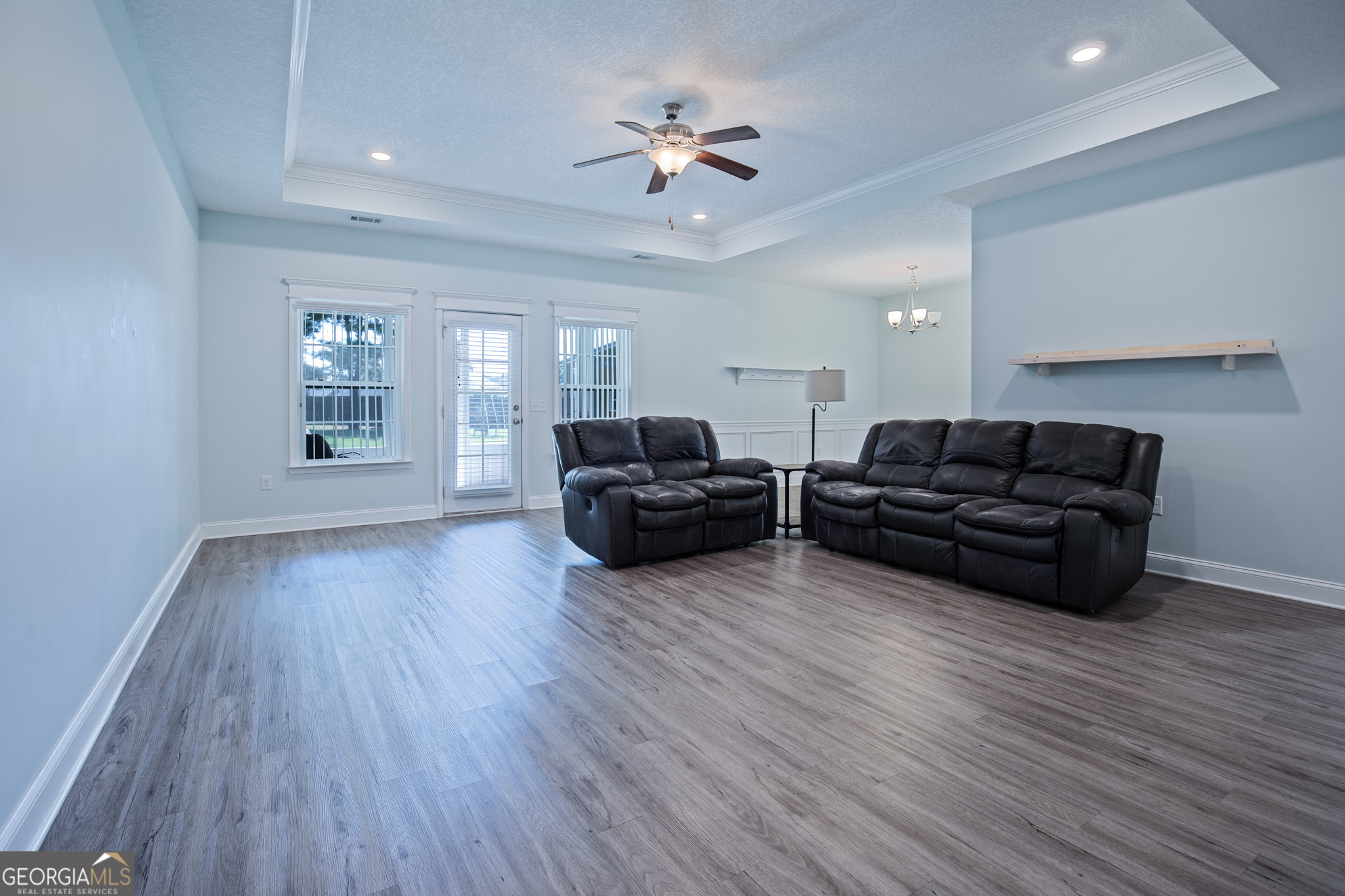 3453 John Wells Road Ludowici, GA 31316 - Photo 14 of 51 a living room with furniture and wooden floor