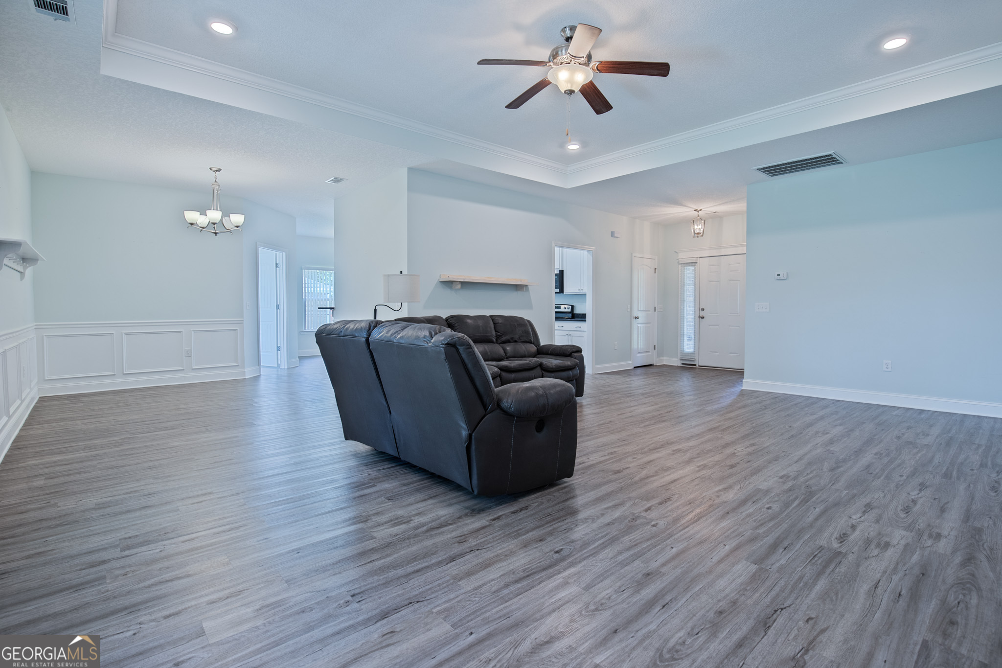 3453 John Wells Road Ludowici, GA 31316 - Photo 15 of 51 a living room with furniture and wooden floor
