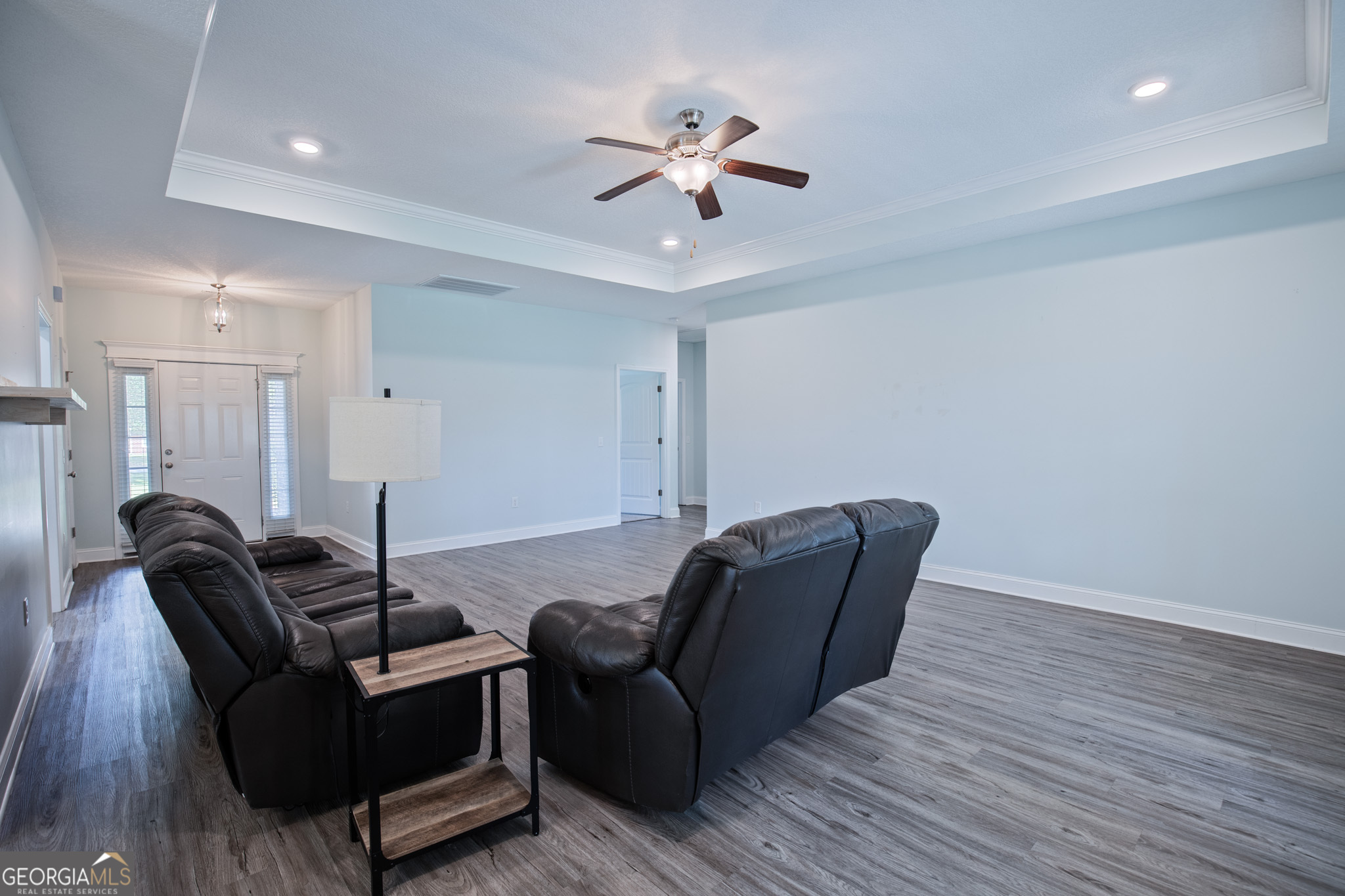 3453 John Wells Road Ludowici, GA 31316 - Photo 16 of 51 a living room with furniture and a ceiling fan