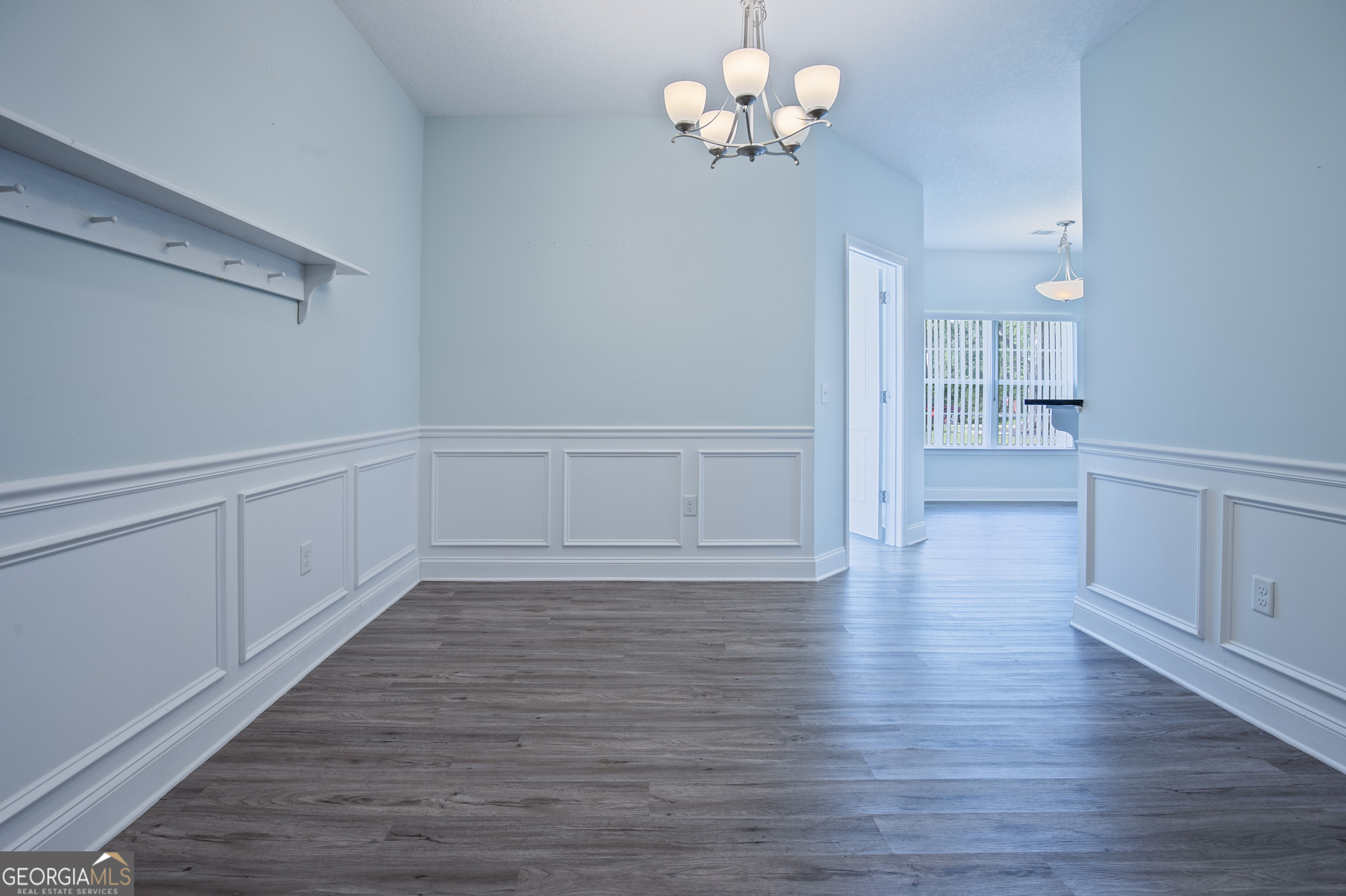 3453 John Wells Road Ludowici, GA 31316 - Photo 17 of 51 a view of an empty room with wooden floor