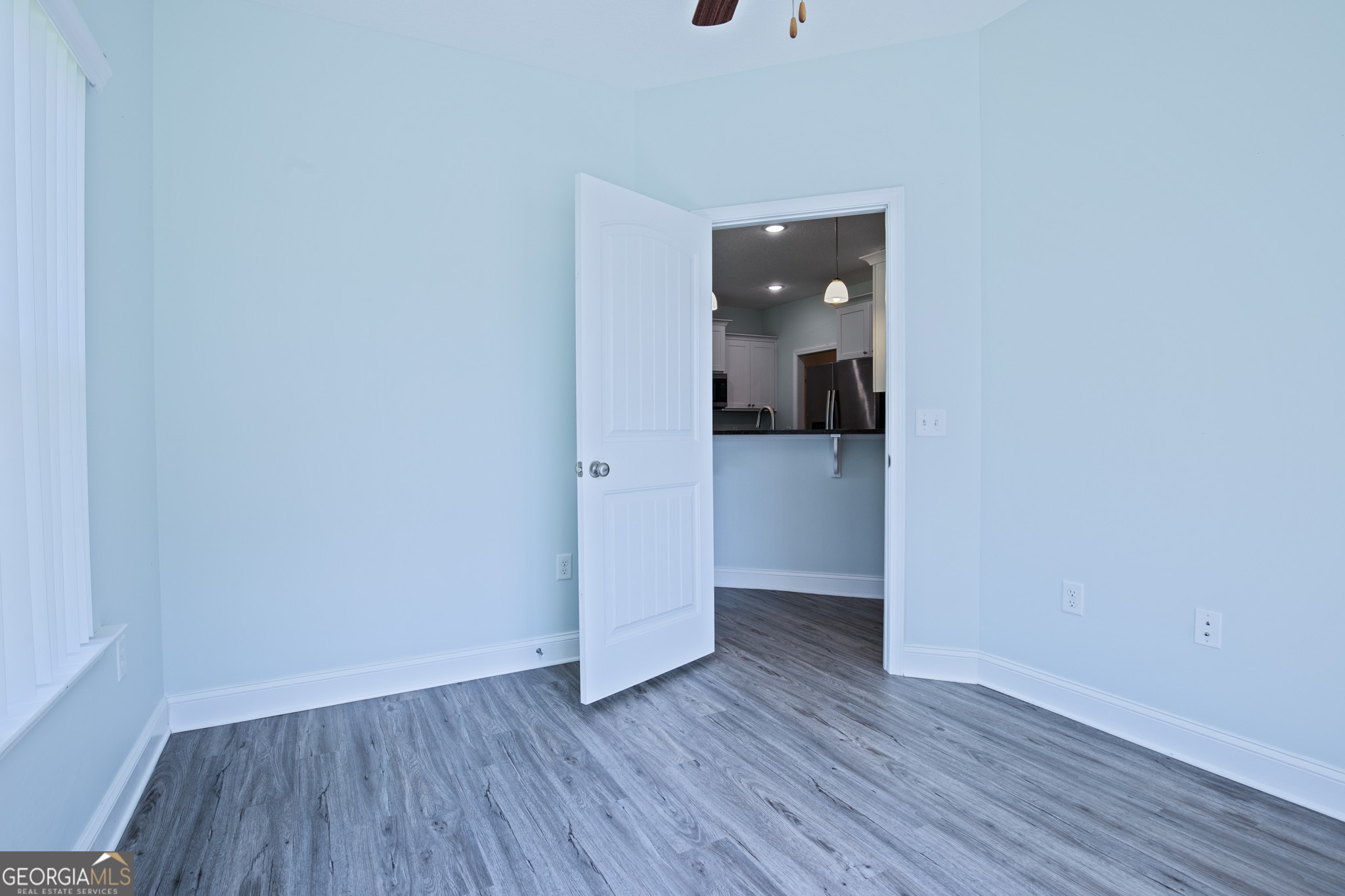 3453 John Wells Road Ludowici, GA 31316 - Photo 20 of 51 a view of a room with wooden floor and a bathroom