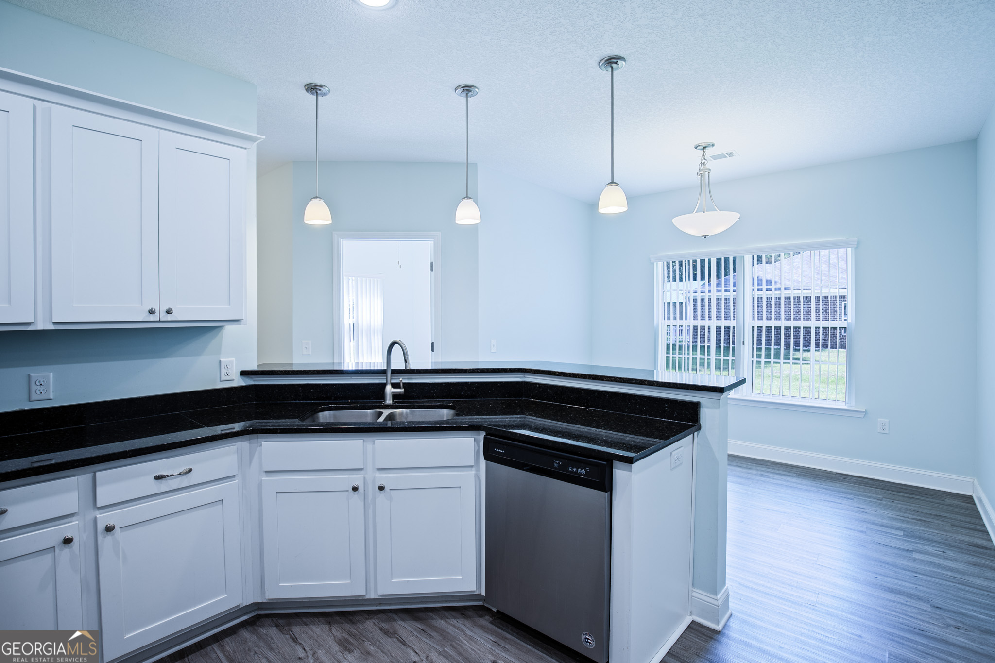 3453 John Wells Road Ludowici, GA 31316 - Photo 24 of 51 a kitchen that has a sink and a stove
