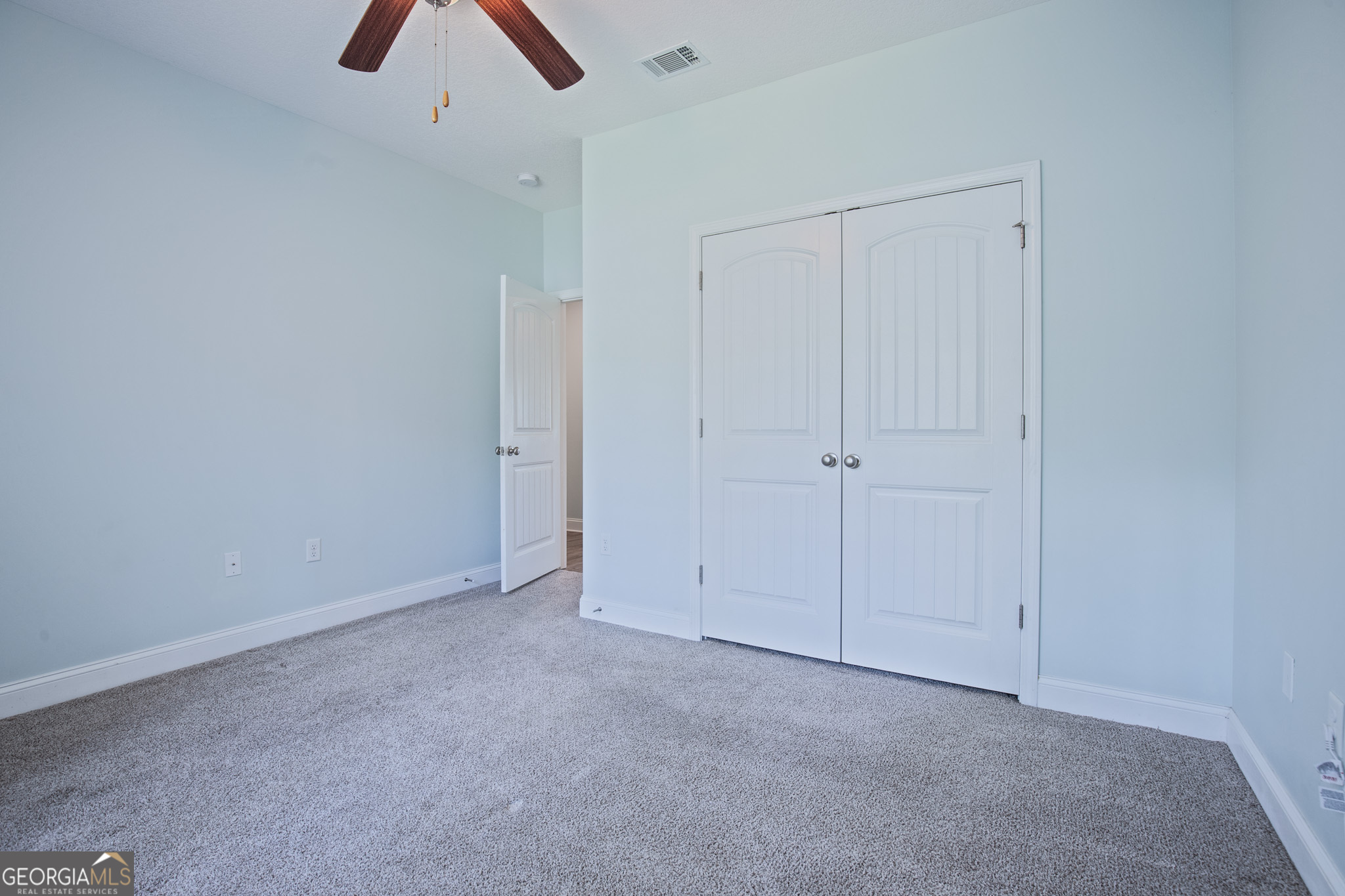 3453 John Wells Road Ludowici, GA 31316 - Photo 29 of 51 an empty room with ceiling fan