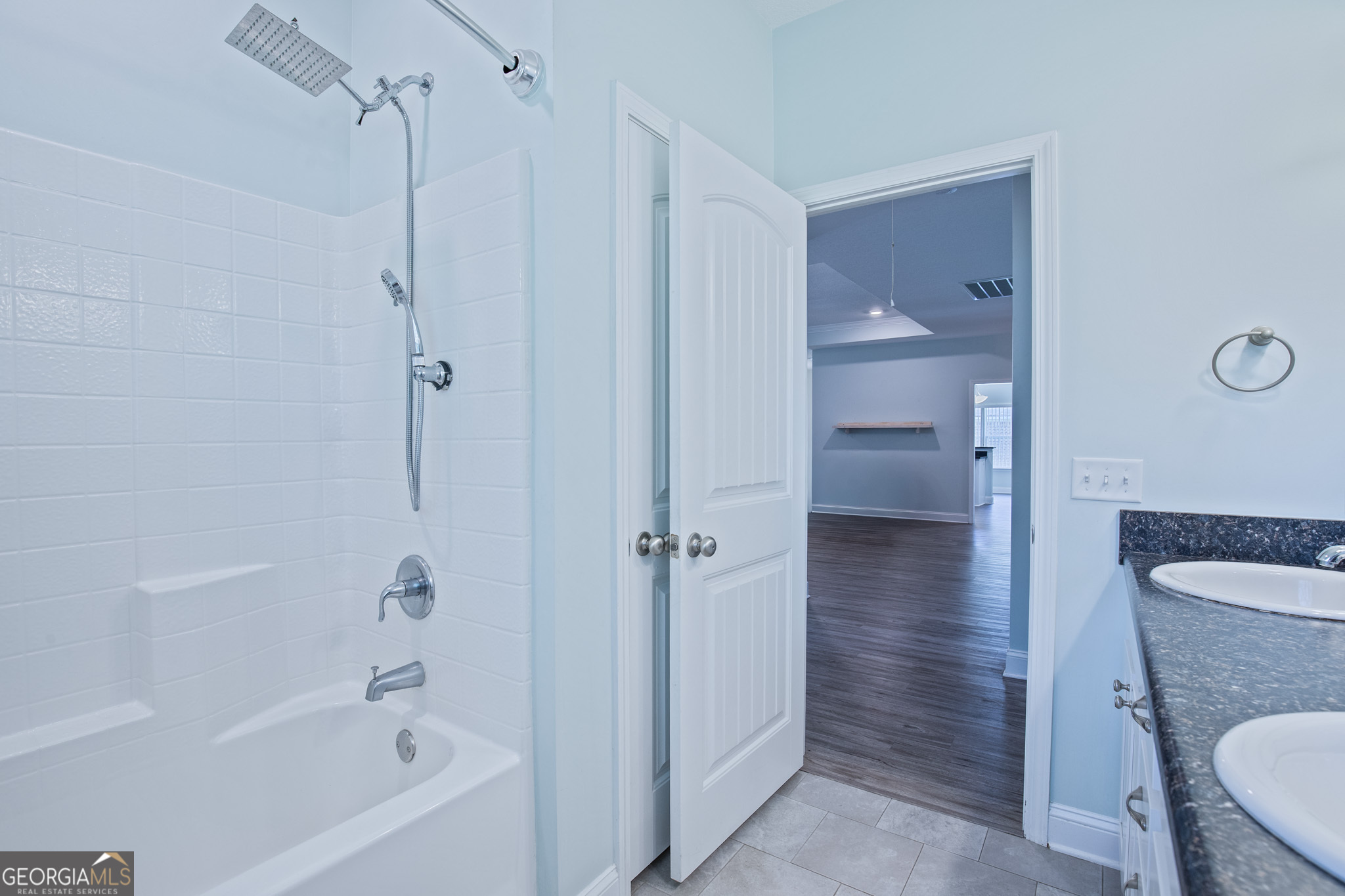 3453 John Wells Road Ludowici, GA 31316 - Photo 33 of 51 a bathroom with a granite countertop bathtub shower and toilet