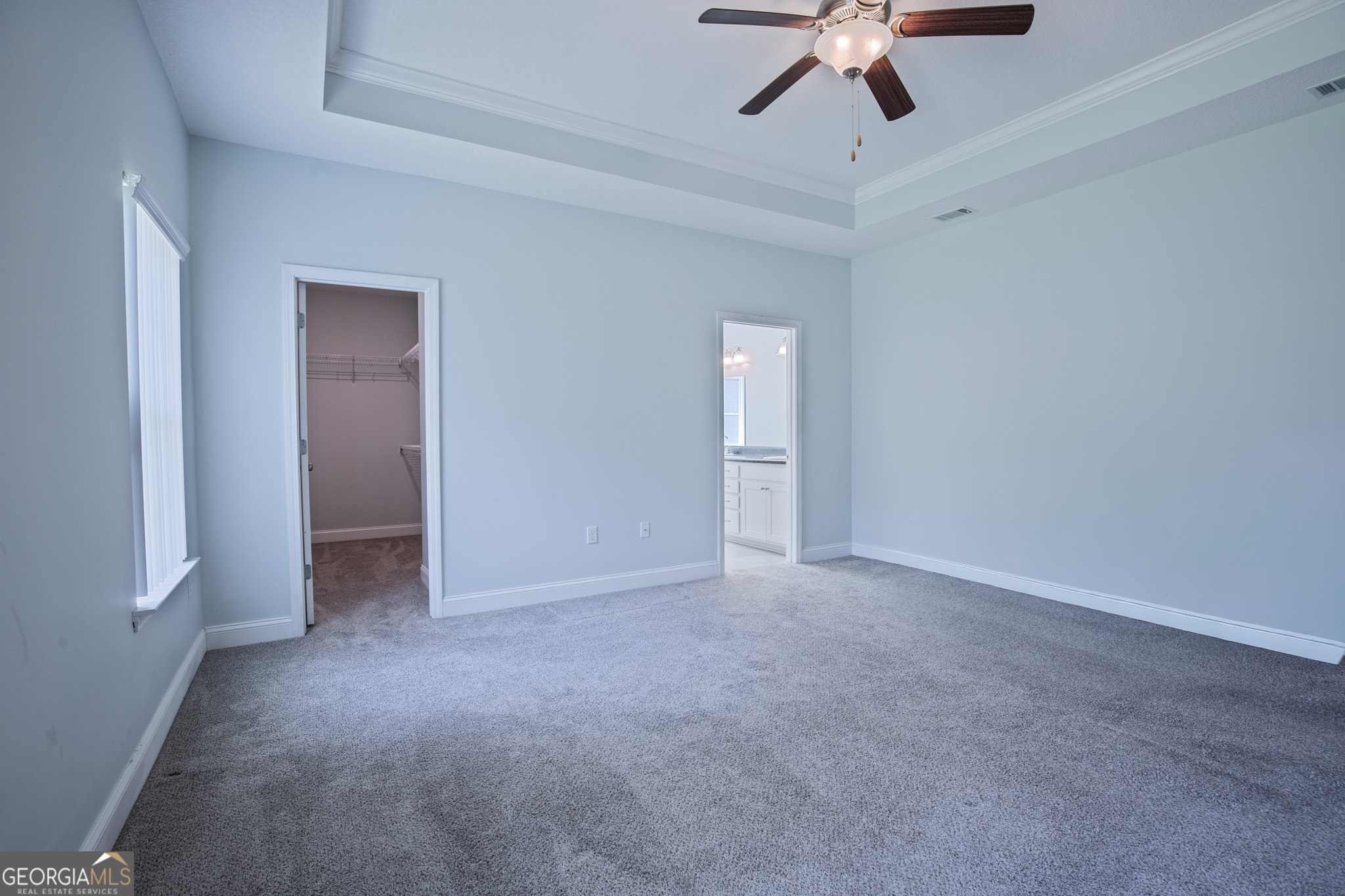 3453 John Wells Road Ludowici, GA 31316 - Photo 37 of 51 a view of an empty room and chandelier fan