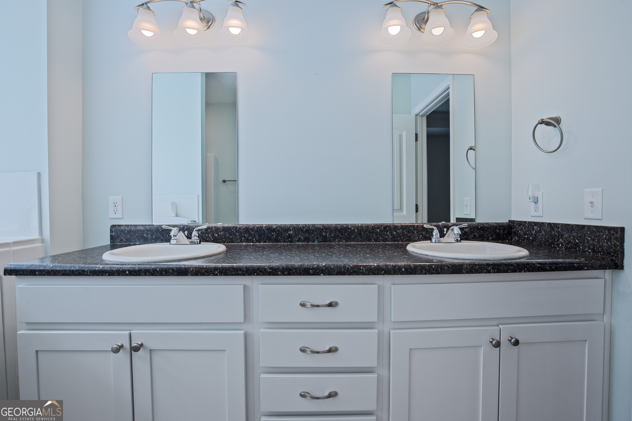 3453 John Wells Road Ludowici, GA 31316 - Photo 39 of 51 a bathroom with a sink and a mirror