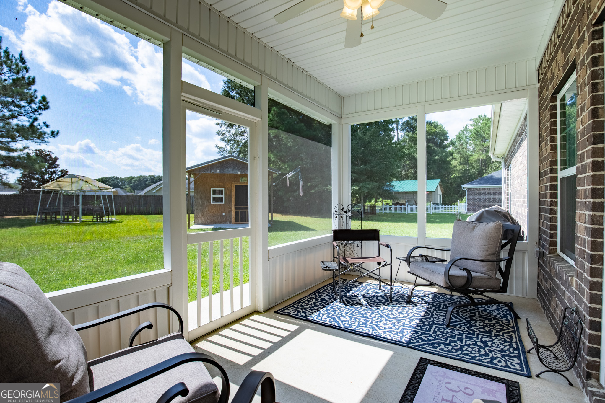 3453 John Wells Road Ludowici, GA 31316 - Photo 43 of 51 a living room with patio furniture and garden