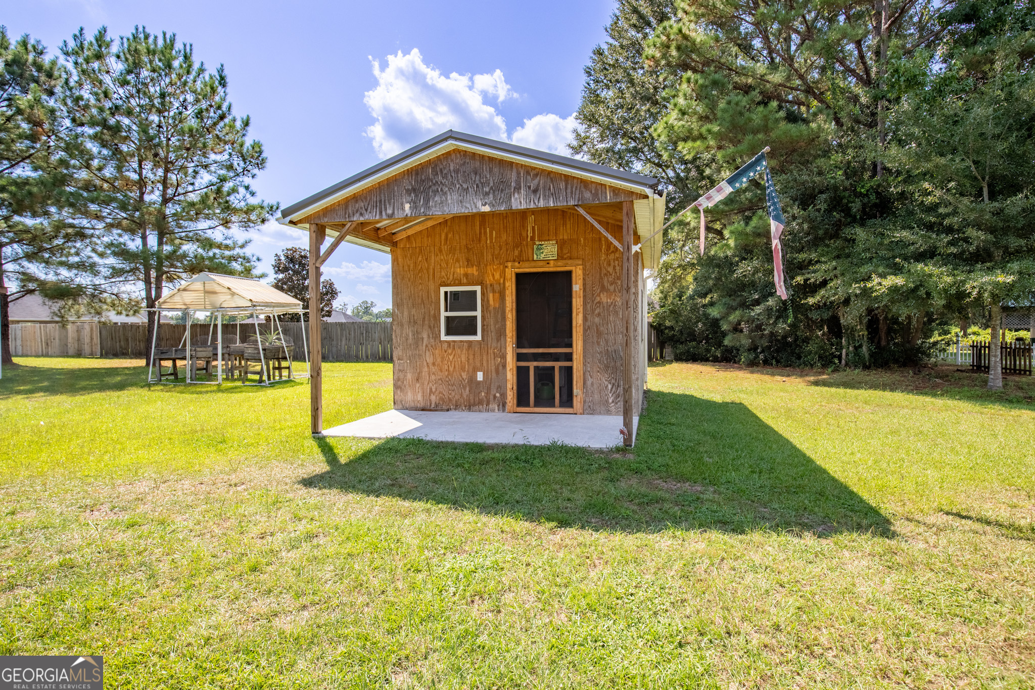 3453 John Wells Road Ludowici, GA 31316 - Photo 45 of 51 a view of a house with a swimming pool