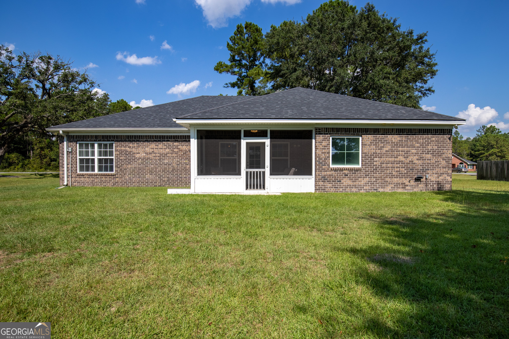 3453 John Wells Road Ludowici, GA 31316 - Photo 49 of 51 a front view of a house with a garden