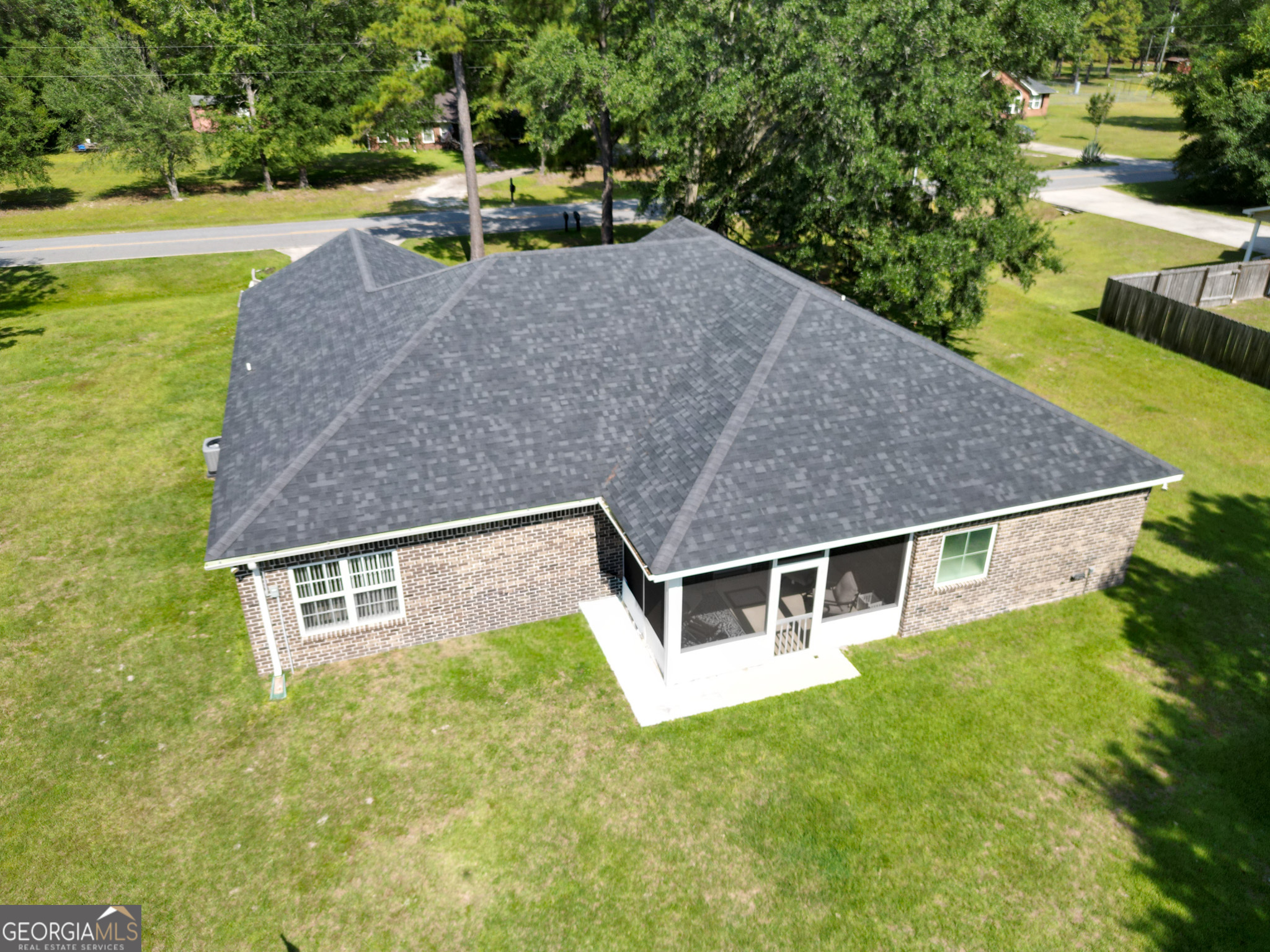 3453 John Wells Road Ludowici, GA 31316 - Photo 7 of 51 an aerial view of a house with swimming pool garden and tall trees