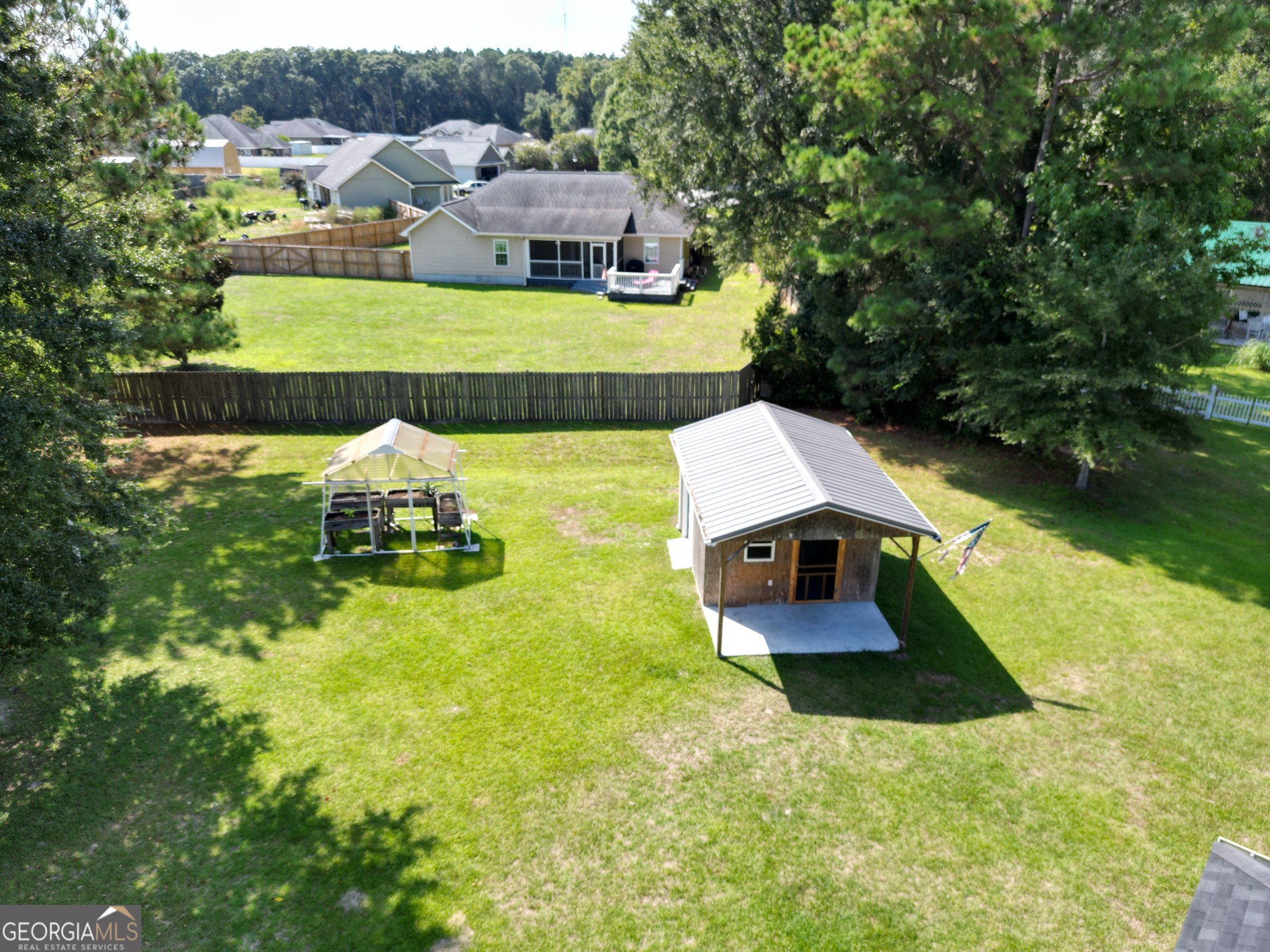 3453 John Wells Road Ludowici, GA 31316 - Photo 8 of 51 a view of a house with swimming pool