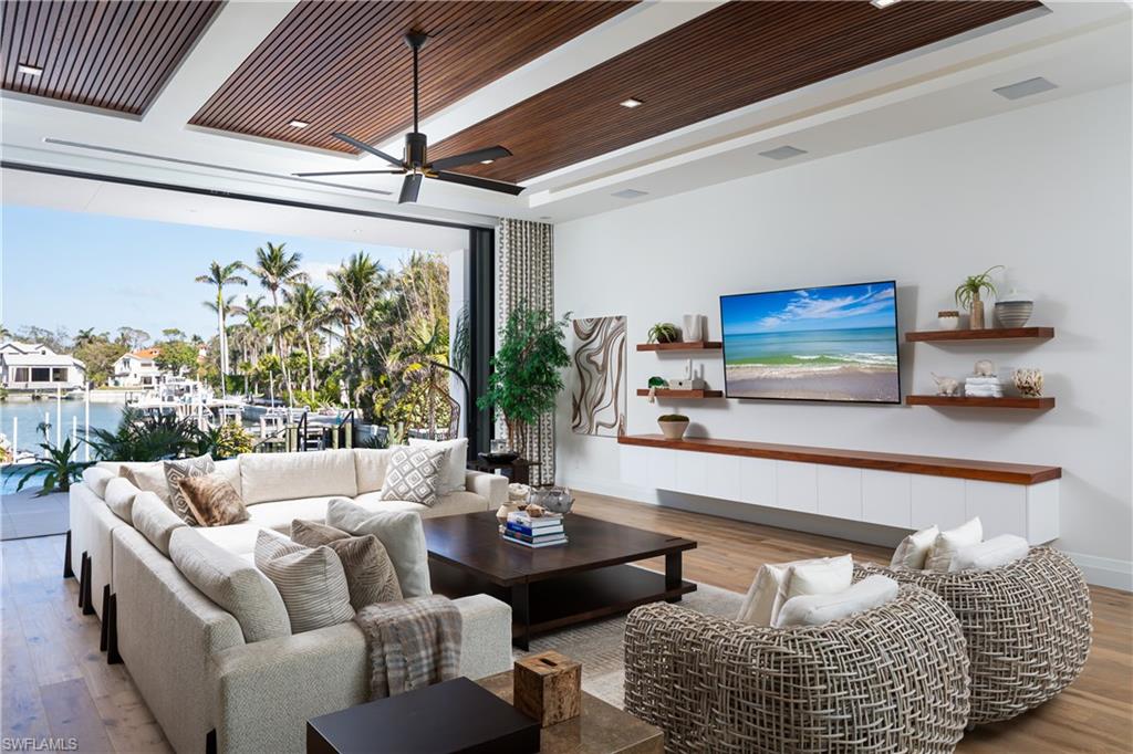 441 Mooring Line Drive Naples, FL 34102 - Photo 13 of 50 a living room with furniture