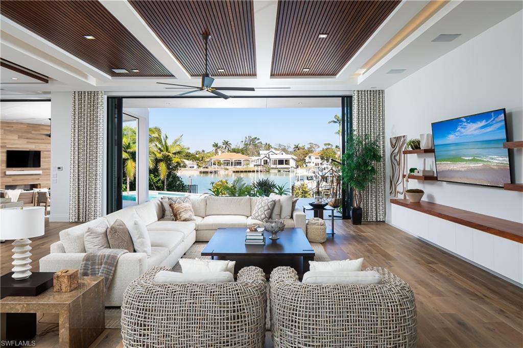 441 Mooring Line Drive Naples, FL 34102 - Photo 14 of 50 a living room with furniture