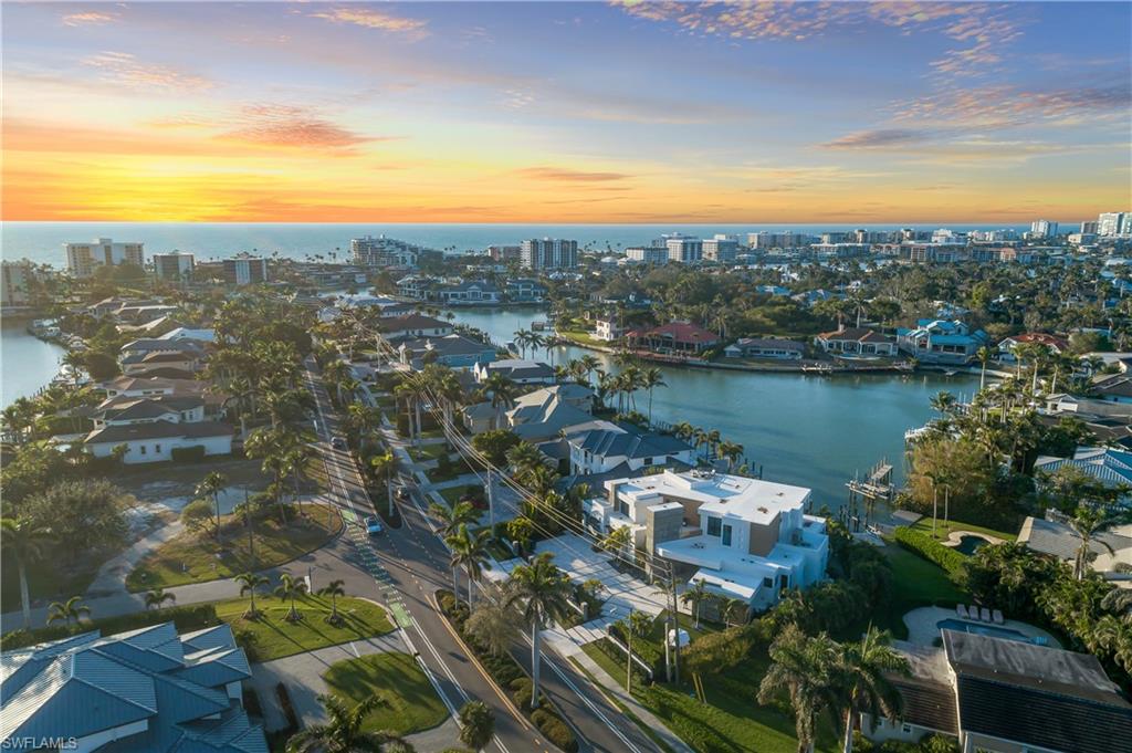 441 Mooring Line Drive Naples, FL 34102 - Photo 2 of 50 a view of a city with lake