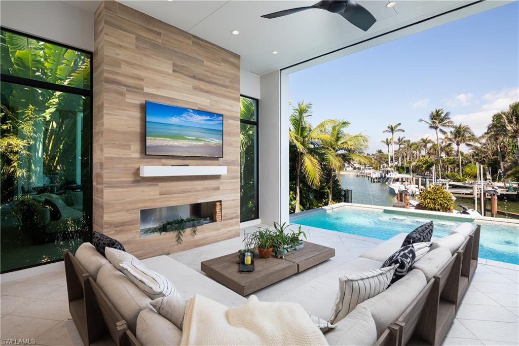 441 Mooring Line Drive Naples, FL 34102 - Photo 22 of 50 a outdoor space with furniture