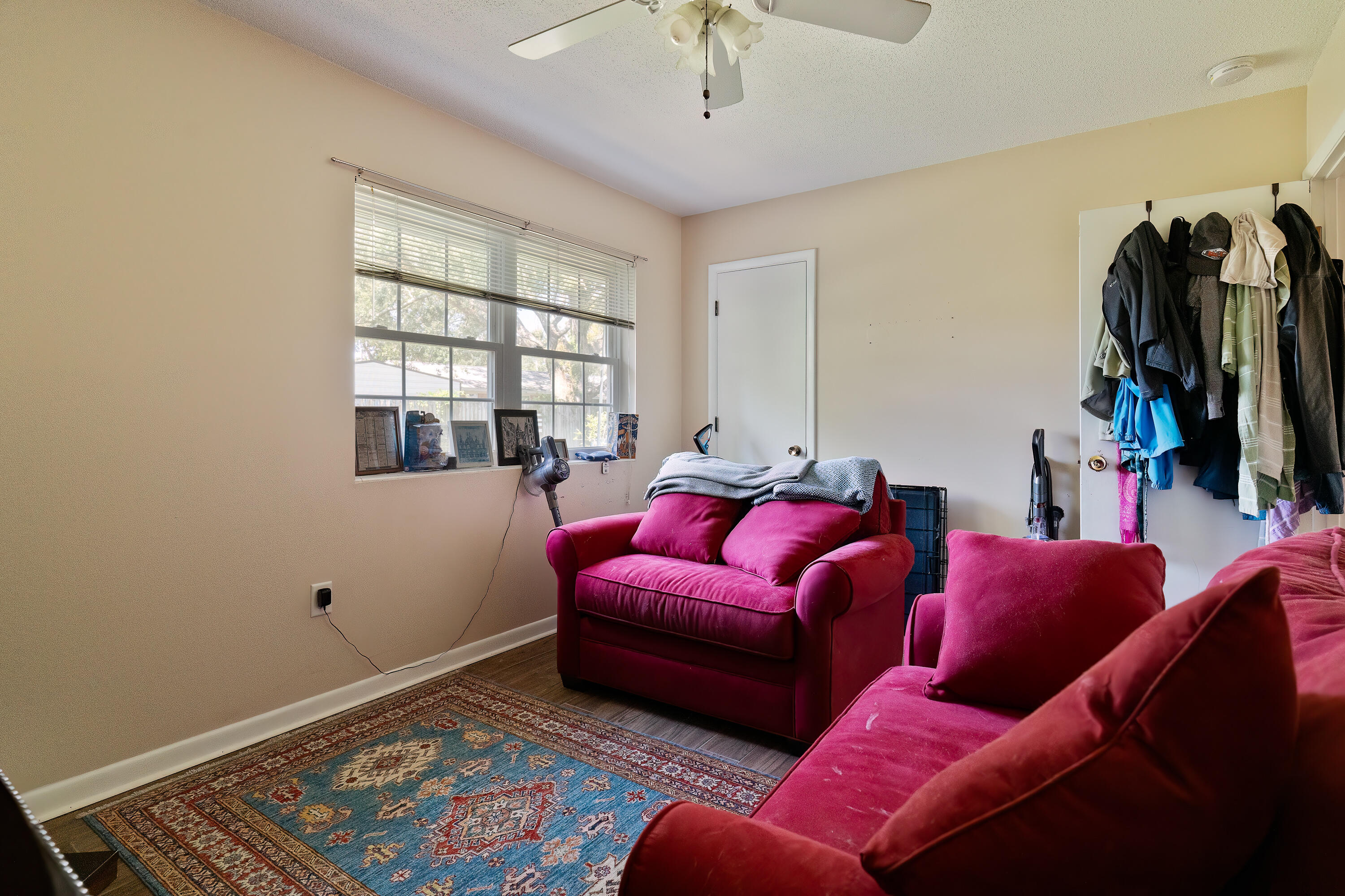 35 James Avenue Shalimar, FL 32579 - Photo 18 of 44 a living room with furniture and a window