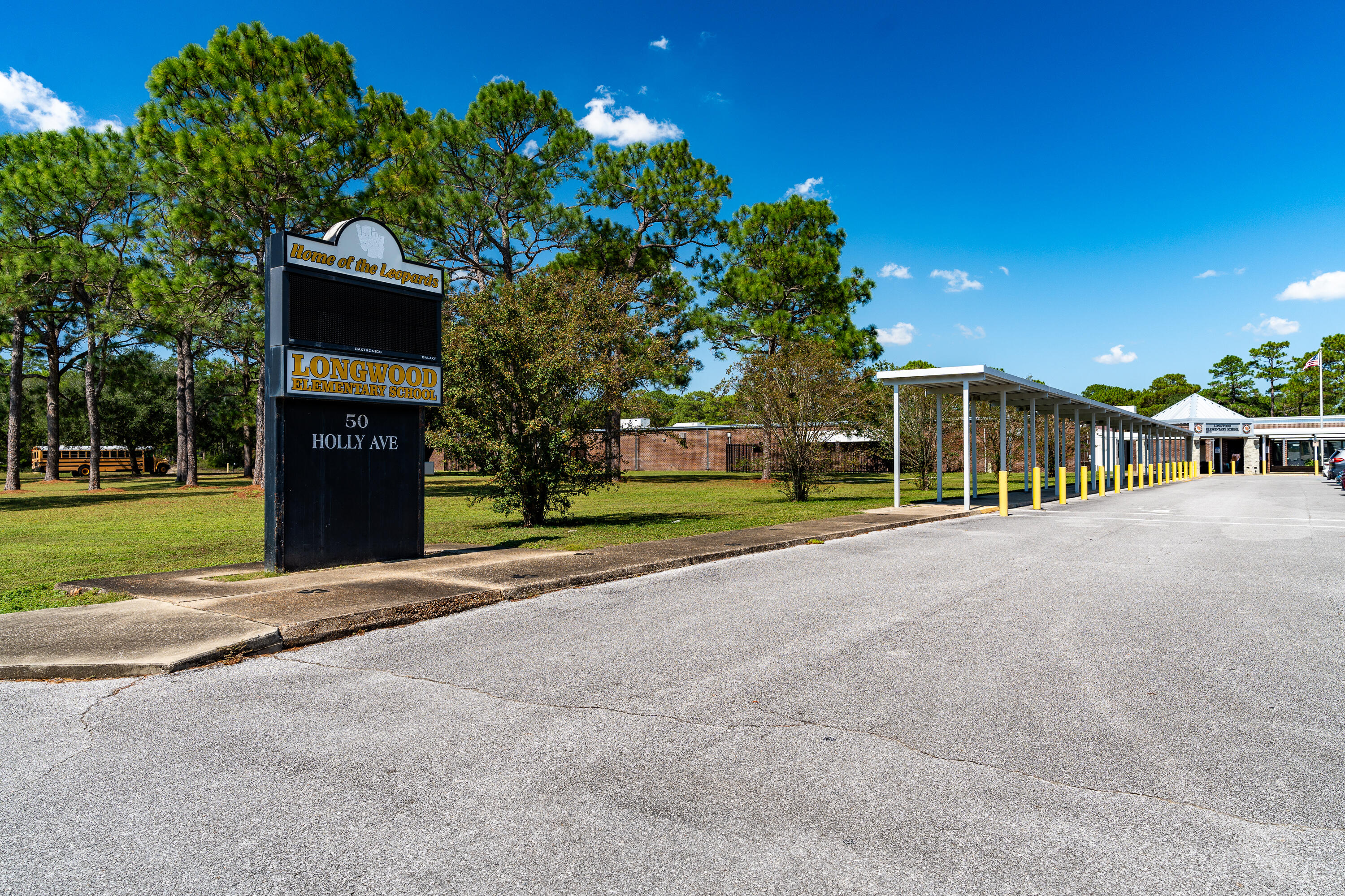 35 James Avenue Shalimar, FL 32579 - Photo 2 of 44 a view of a house with a yard and potted plants