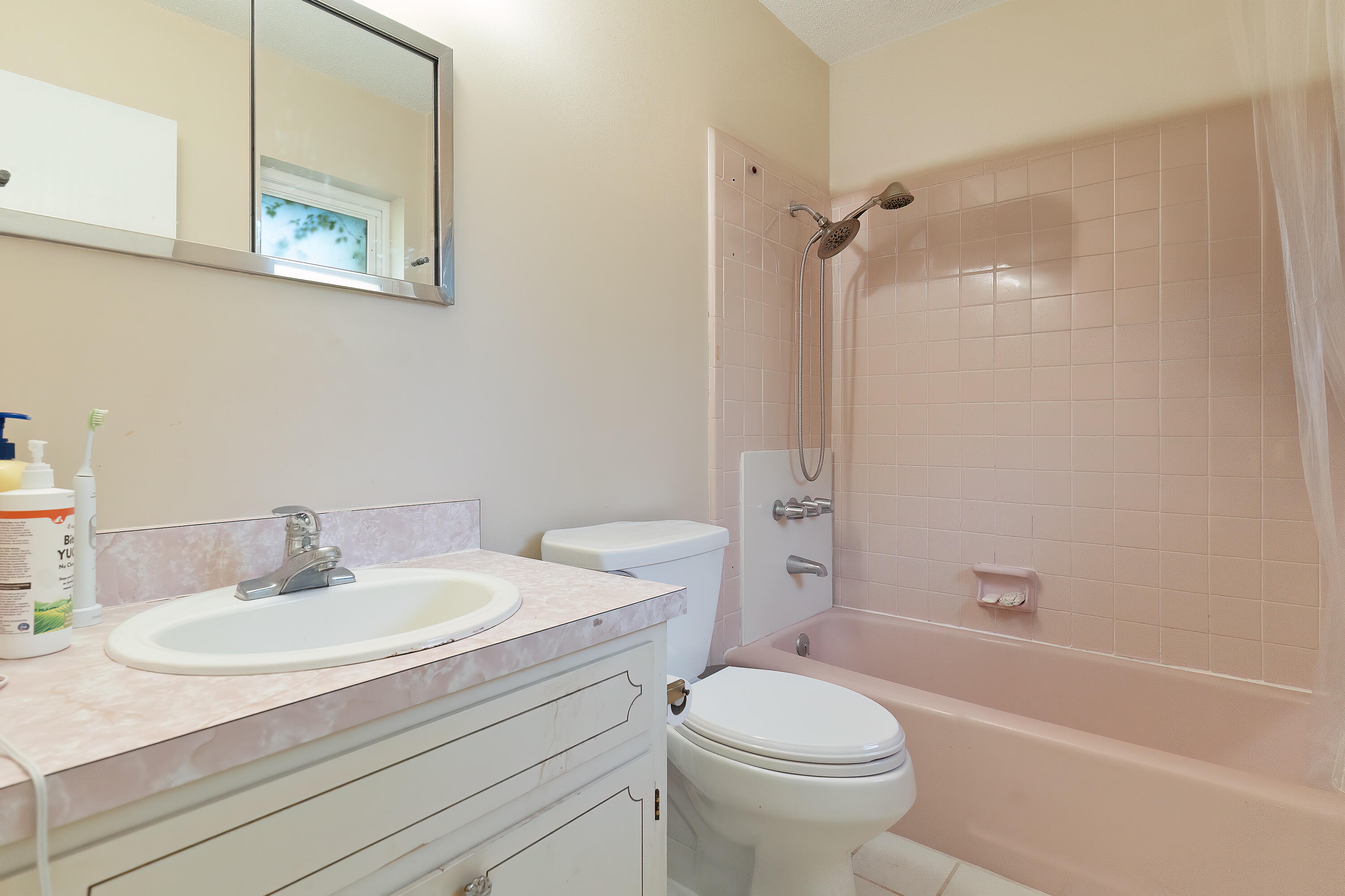 35 James Avenue Shalimar, FL 32579 - Photo 21 of 44 a bathroom with a sink toilet and shower