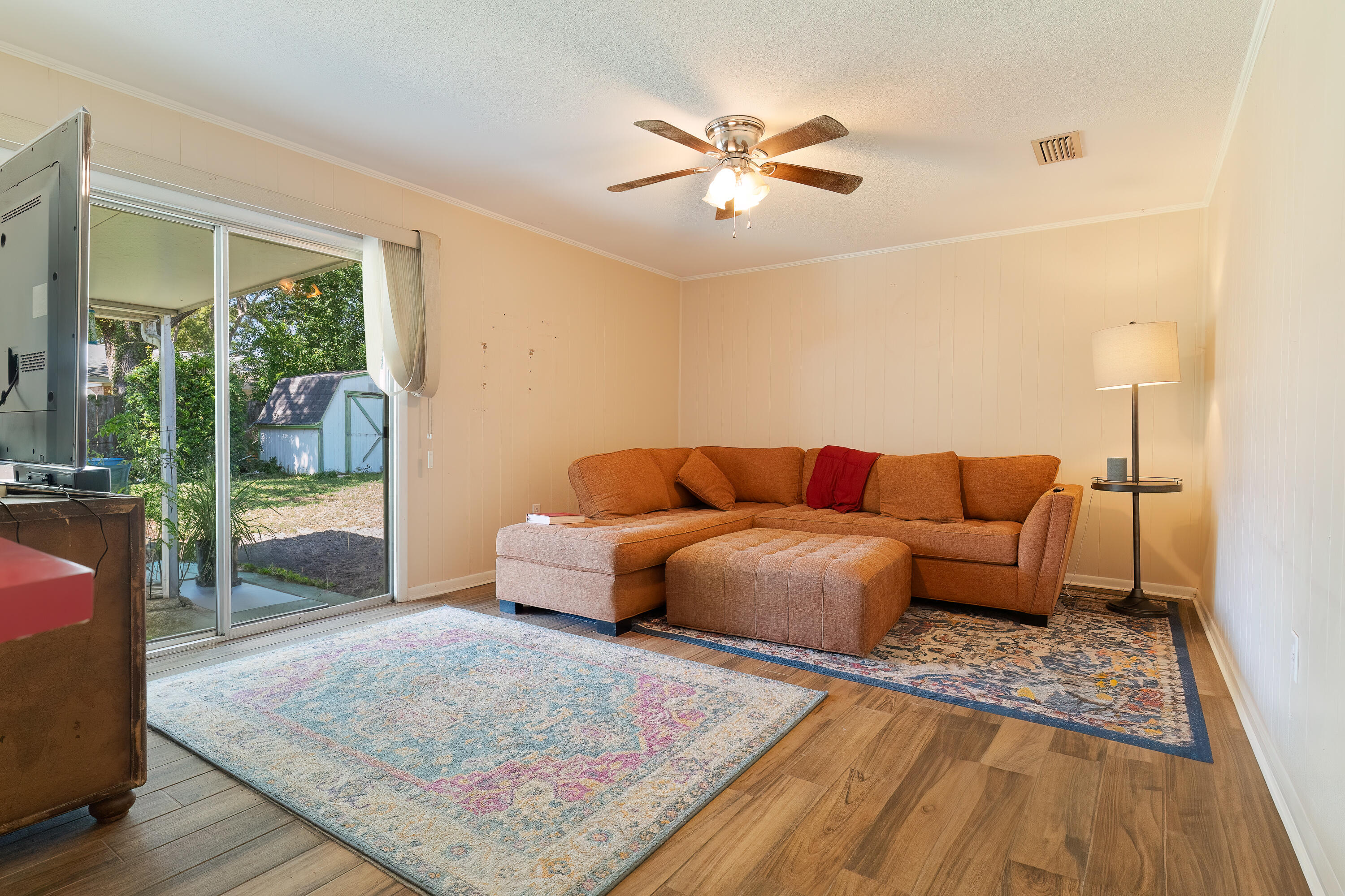 35 James Avenue Shalimar, FL 32579 - Photo 22 of 44 a living room with furniture and a rug