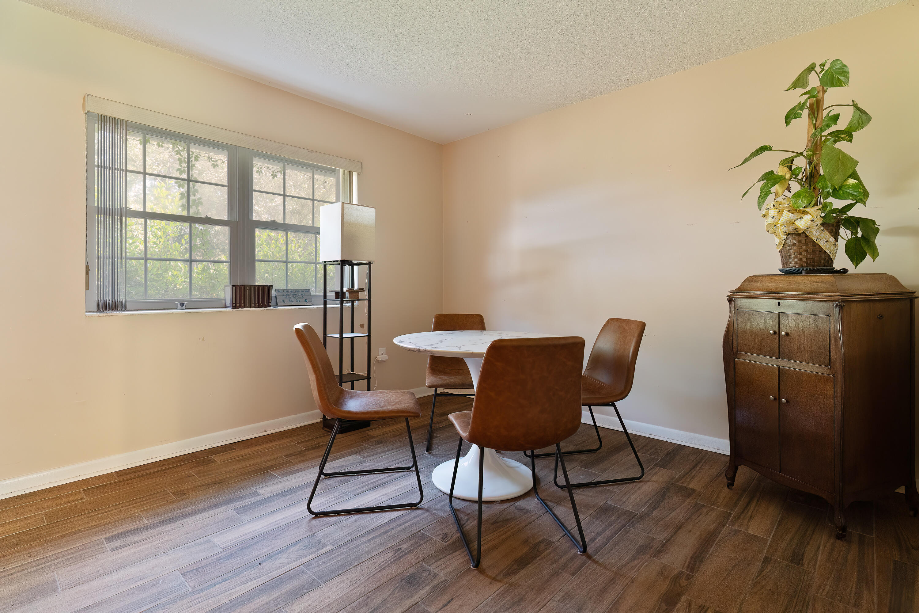 35 James Avenue Shalimar, FL 32579 - Photo 6 of 44 a view of a dining room with furniture window and wooden floor