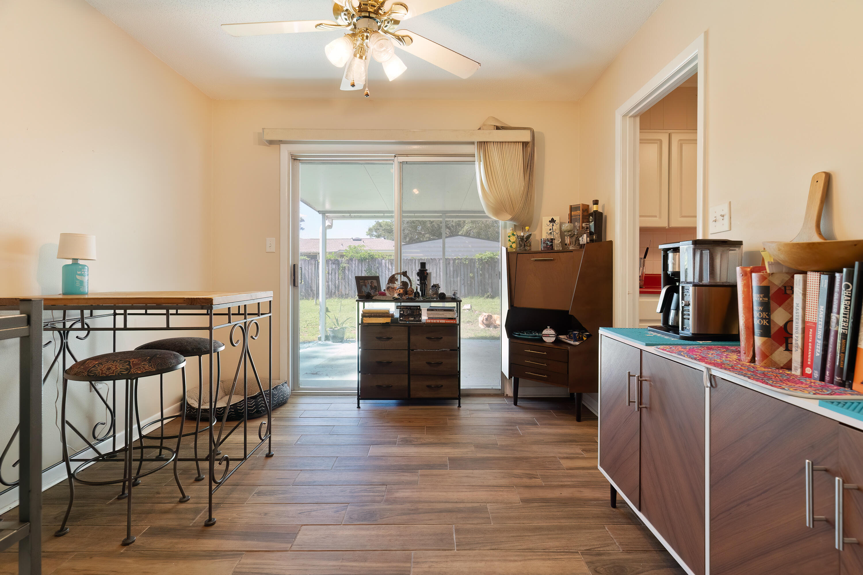 35 James Avenue Shalimar, FL 32579 - Photo 7 of 44 a kitchen with stainless steel appliances wooden floor and dining table