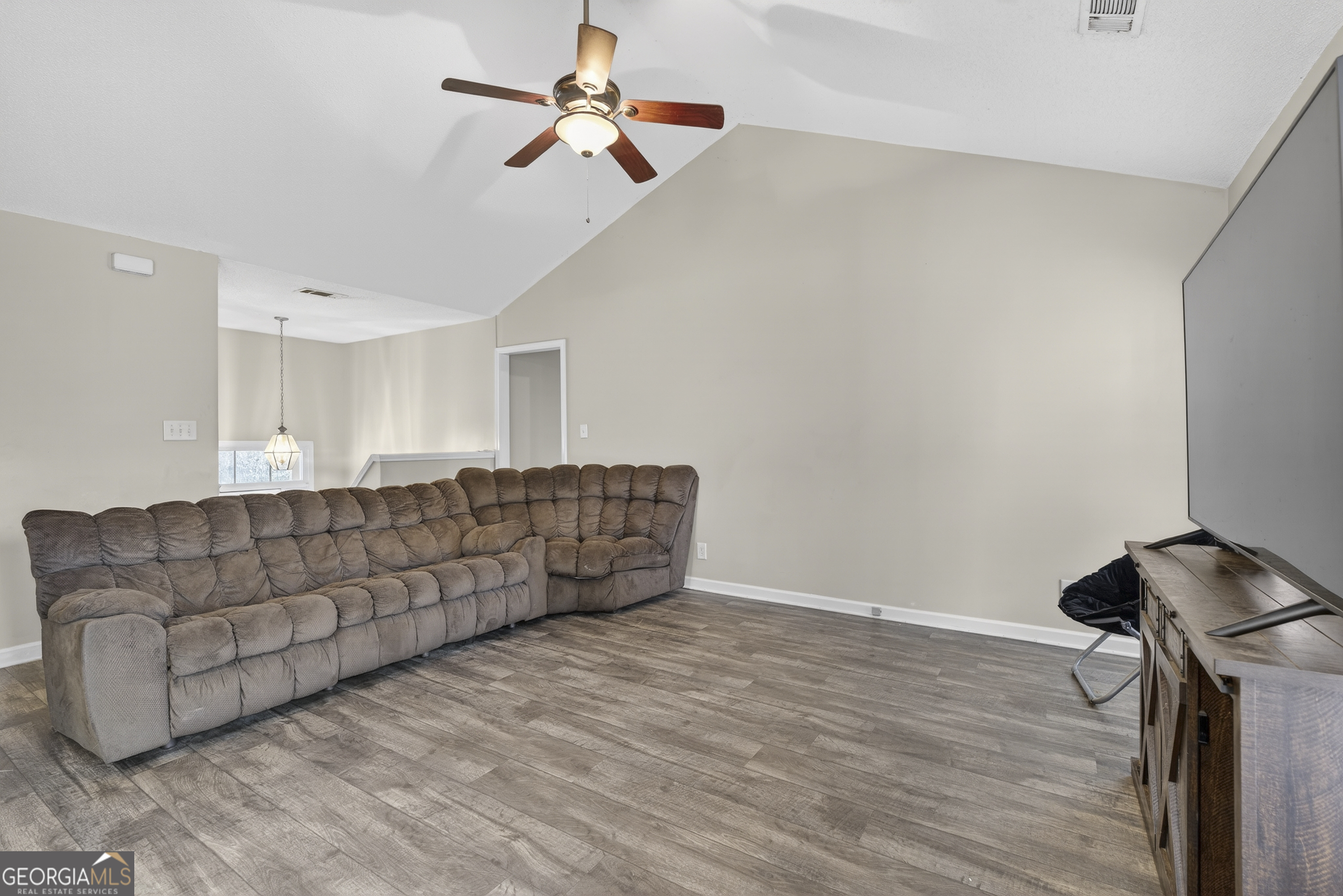226 Amy Lane Gray, GA 31032 - Photo 13 of 46 a living room with furniture and a ceiling fan