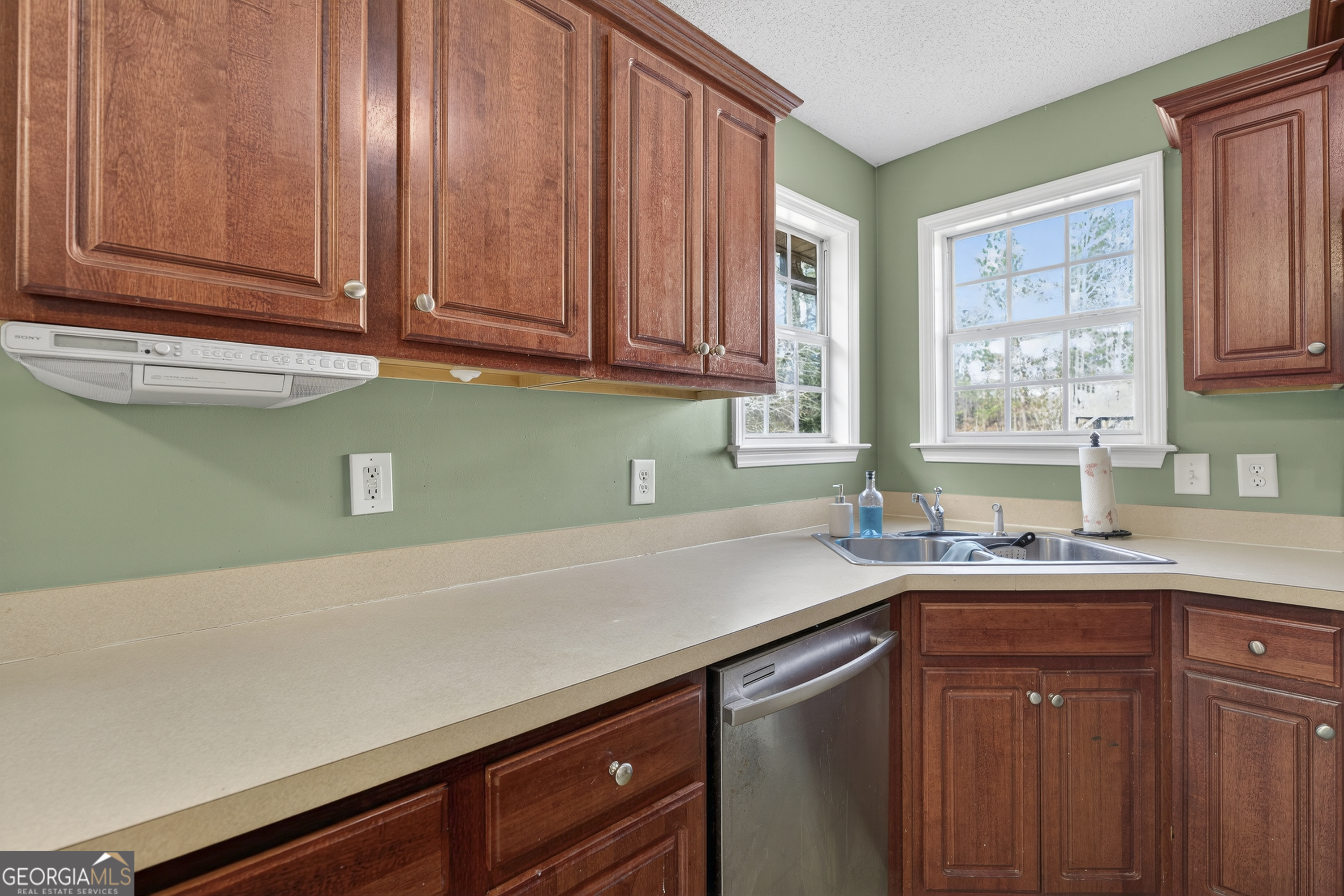 226 Amy Lane Gray, GA 31032 - Photo 17 of 46 a kitchen with a sink cabinets and window