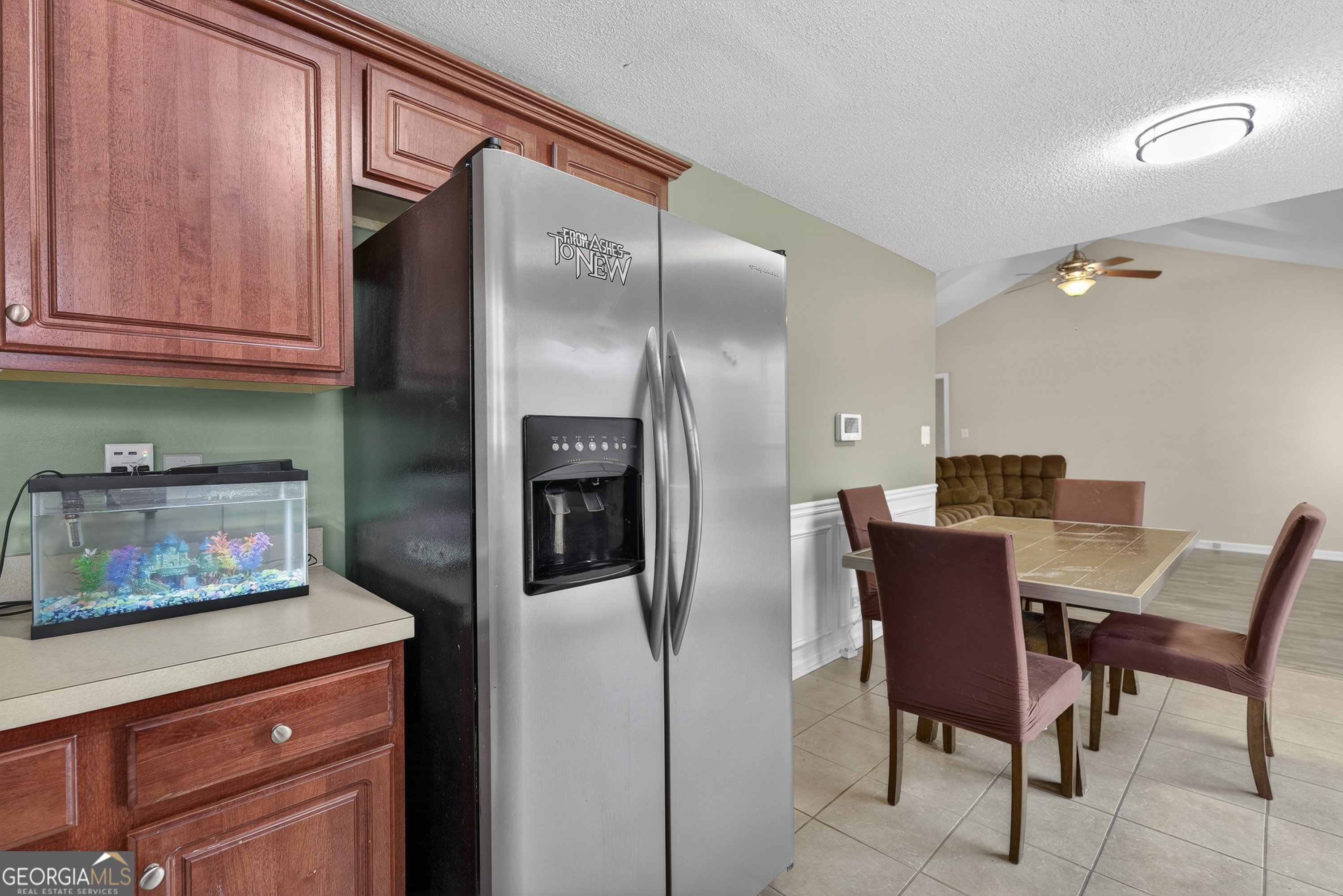 226 Amy Lane Gray, GA 31032 - Photo 19 of 46 a kitchen with stainless steel appliances granite countertop a refrigerator and microwave