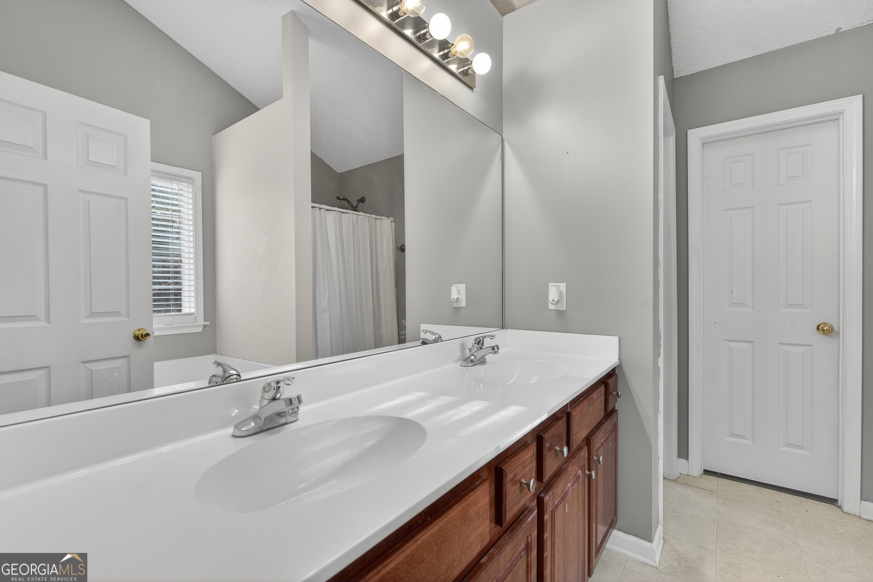 226 Amy Lane Gray, GA 31032 - Photo 29 of 46 a bathroom with a sink double vanity and a mirror