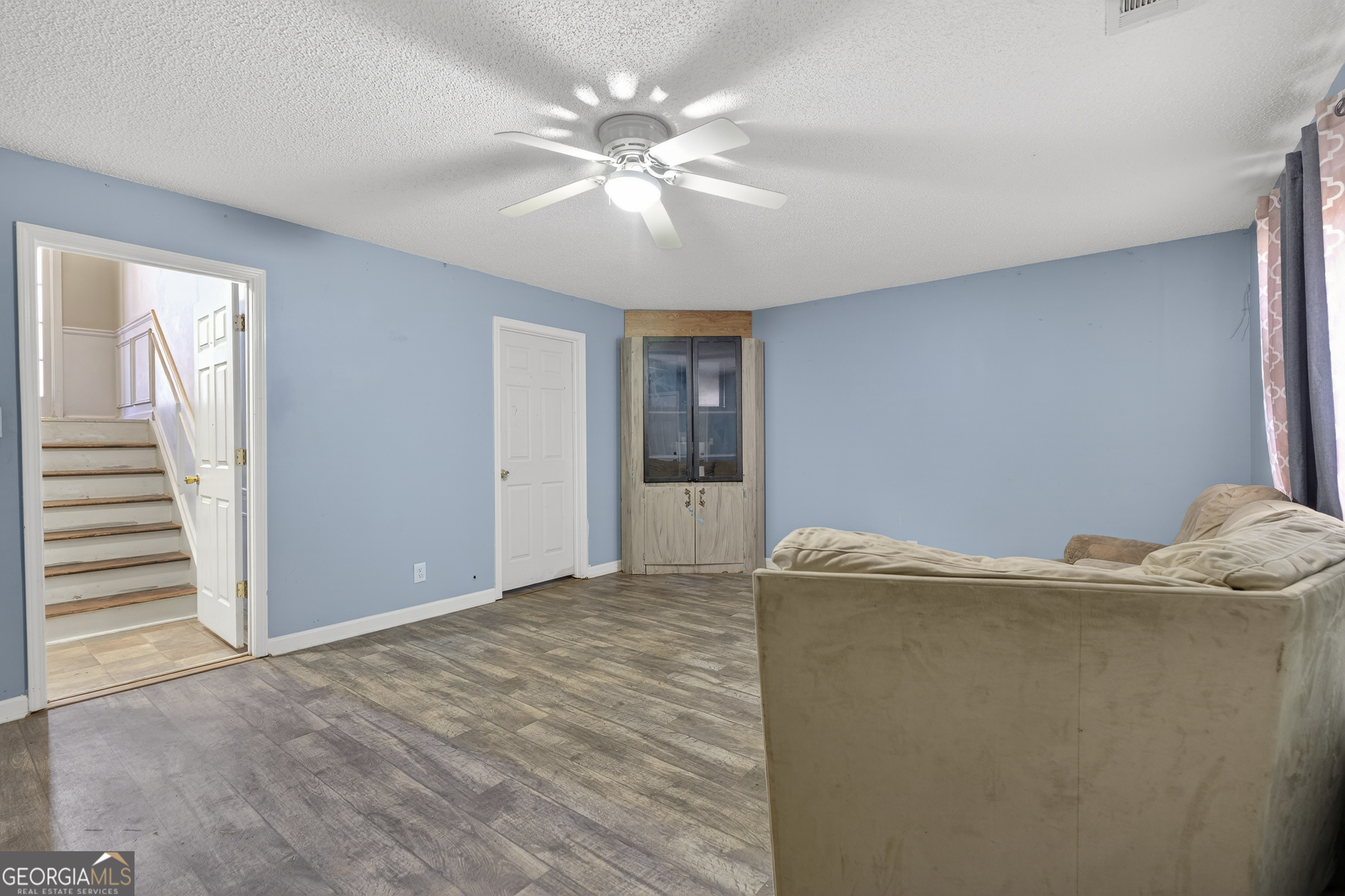 226 Amy Lane Gray, GA 31032 - Photo 34 of 46 an empty room with windows and fan
