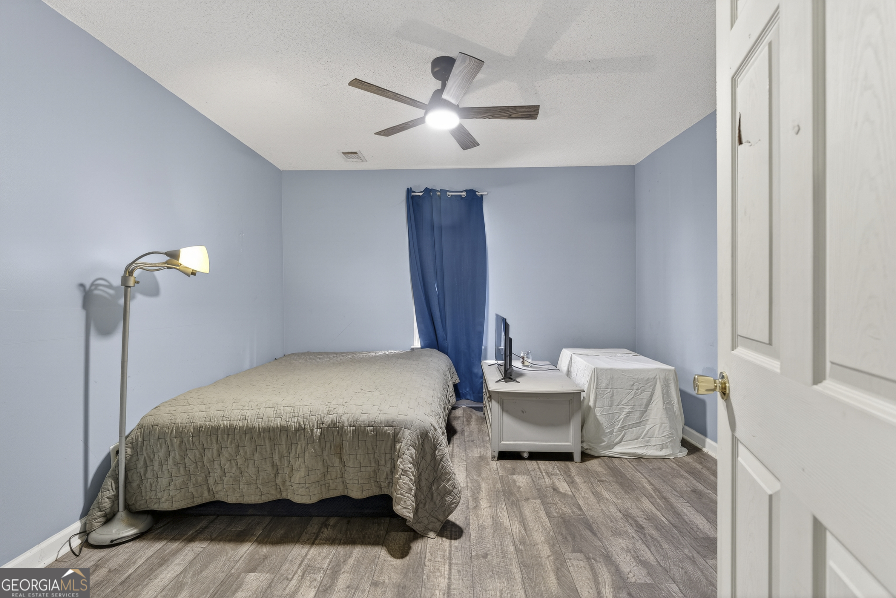 226 Amy Lane Gray, GA 31032 - Photo 36 of 46 a bedroom with a bed and a table