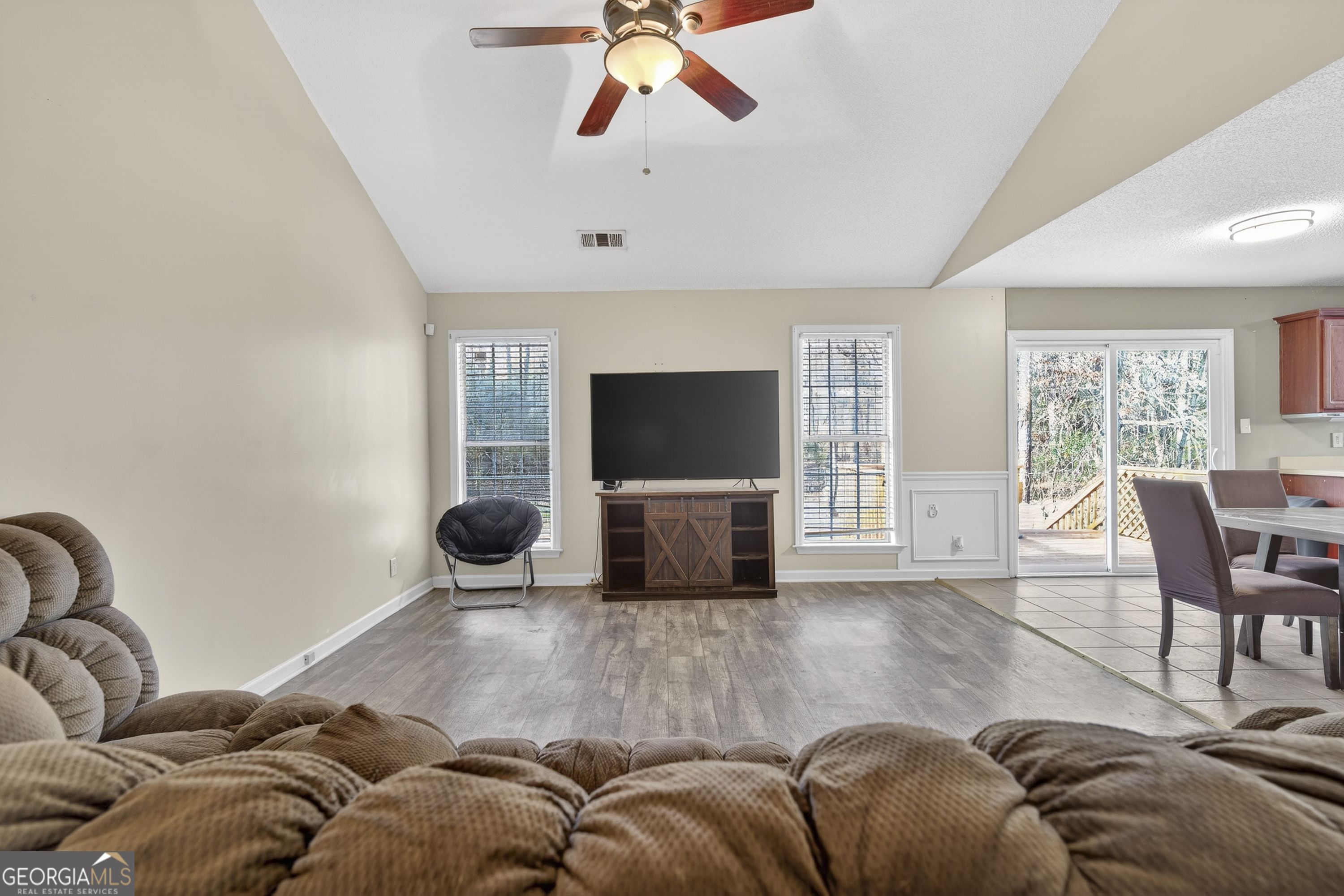 226 Amy Lane Gray, GA 31032 - Photo 8 of 46 a living room with furniture and a flat screen tv