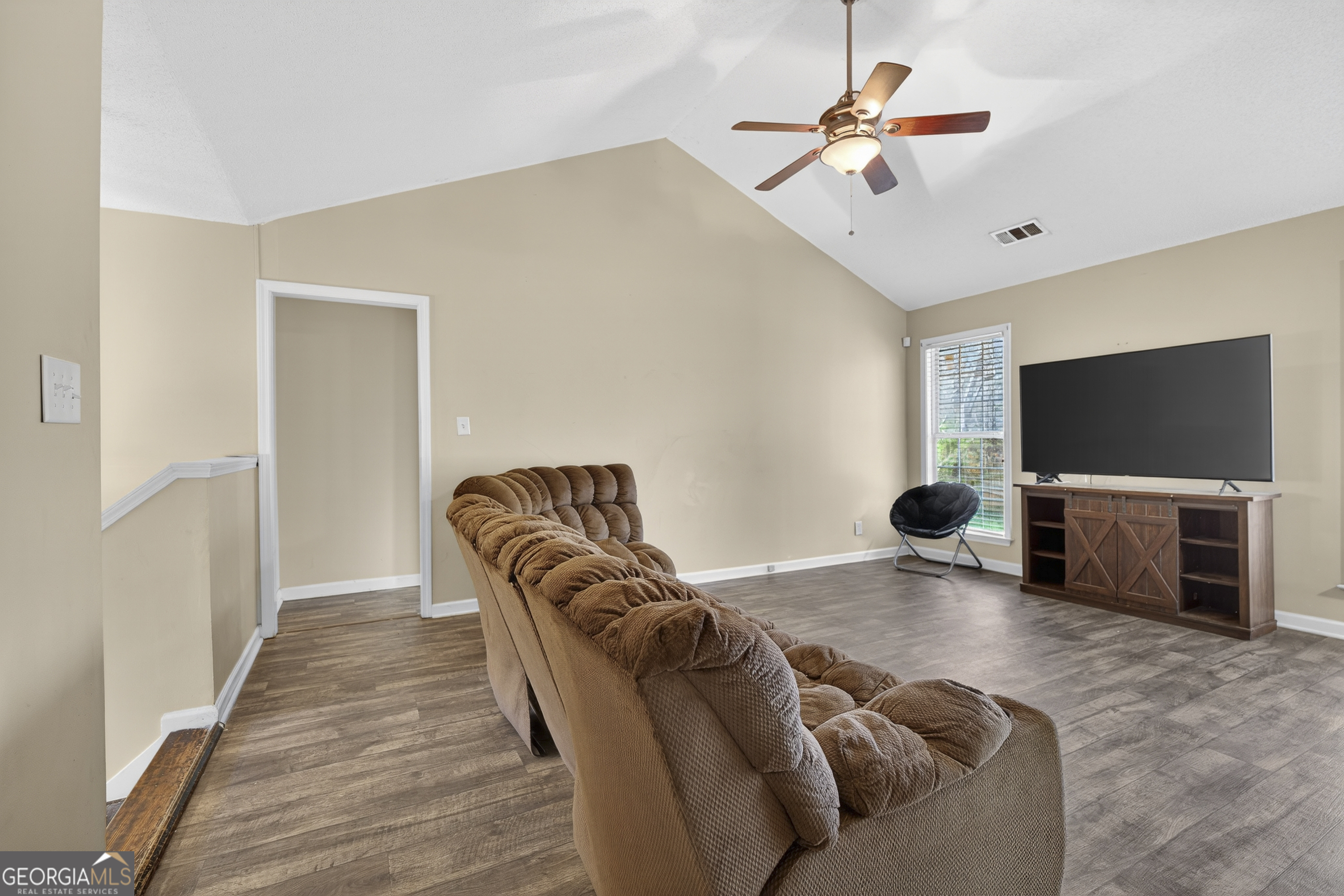226 Amy Lane Gray, GA 31032 - Photo 10 of 46 a living room with furniture and a flat screen tv