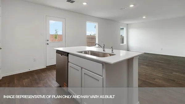 a kitchen with stainless steel appliances granite countertop a stove and a sink