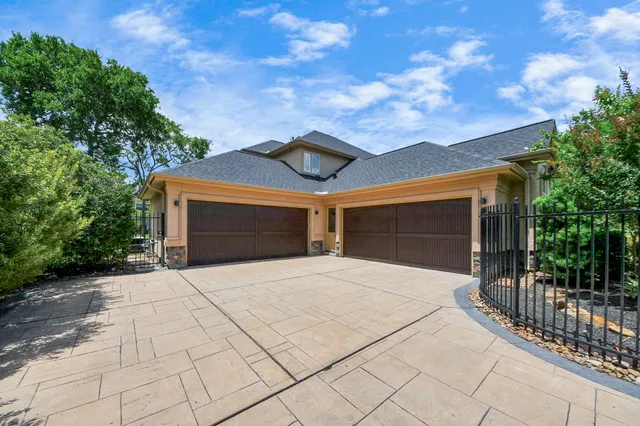 a view of balcony with wooden floor and fence