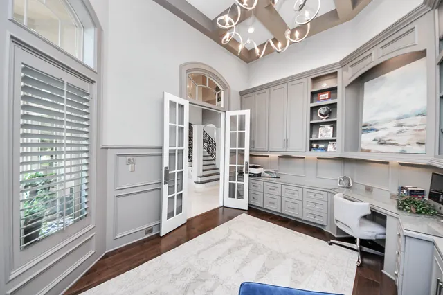 a room with cabinets and window