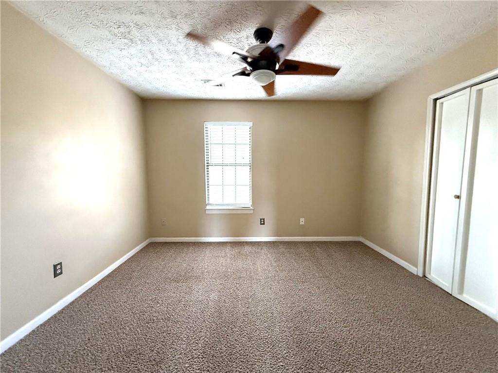 1555 Springleaf Court Southeast Smyrna, GA 30080 - Photo 13 of 19 a view of an empty room with a window