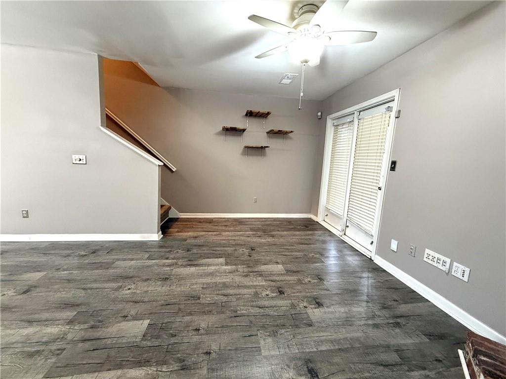 1555 Springleaf Court Southeast Smyrna, GA 30080 - Photo 7 of 19 wooden floor in an empty room