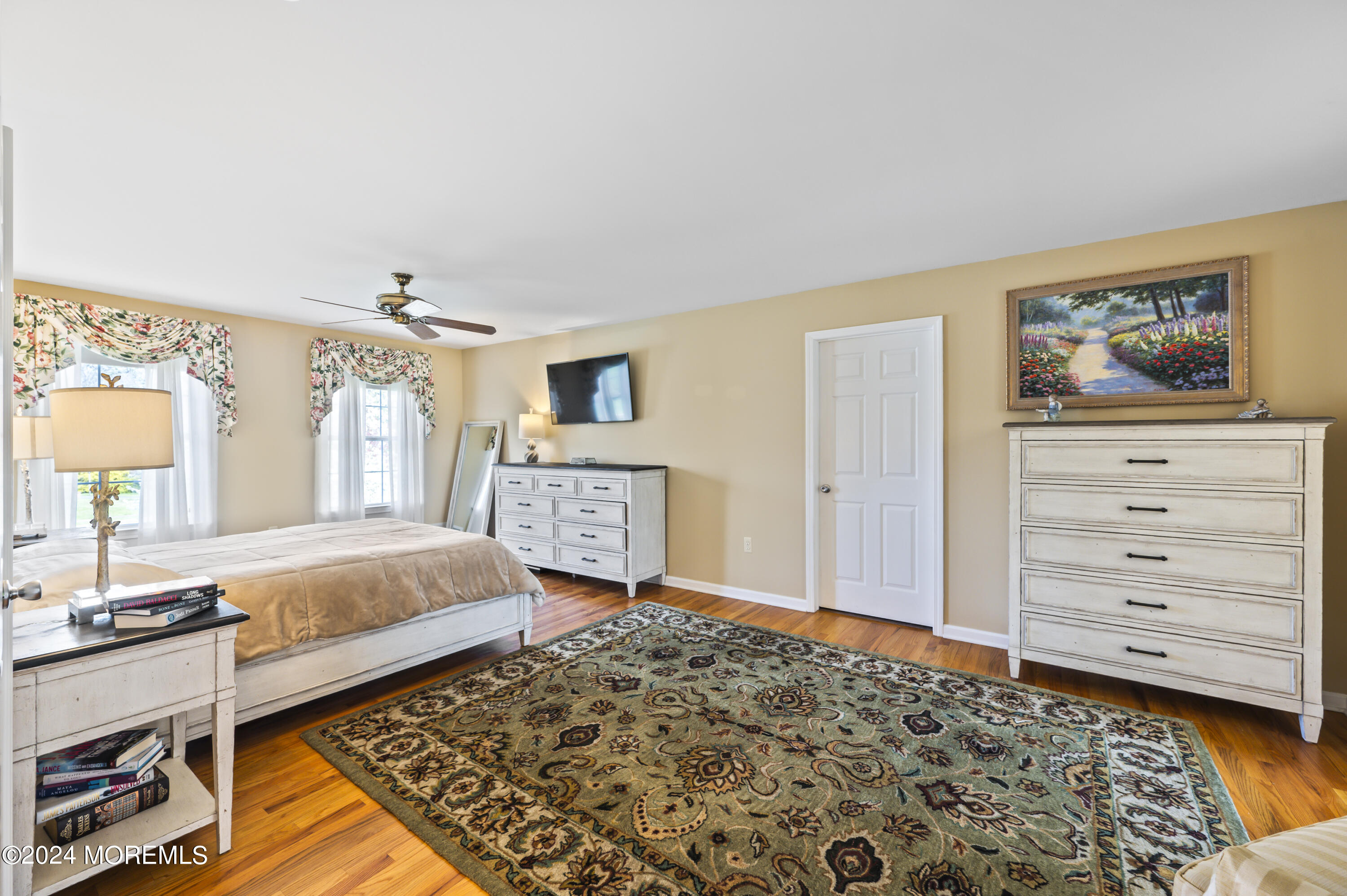 2805 Newman Way Wall, NJ 07719 - Photo 16 of 31 a bedroom with a bed and a dresser in it