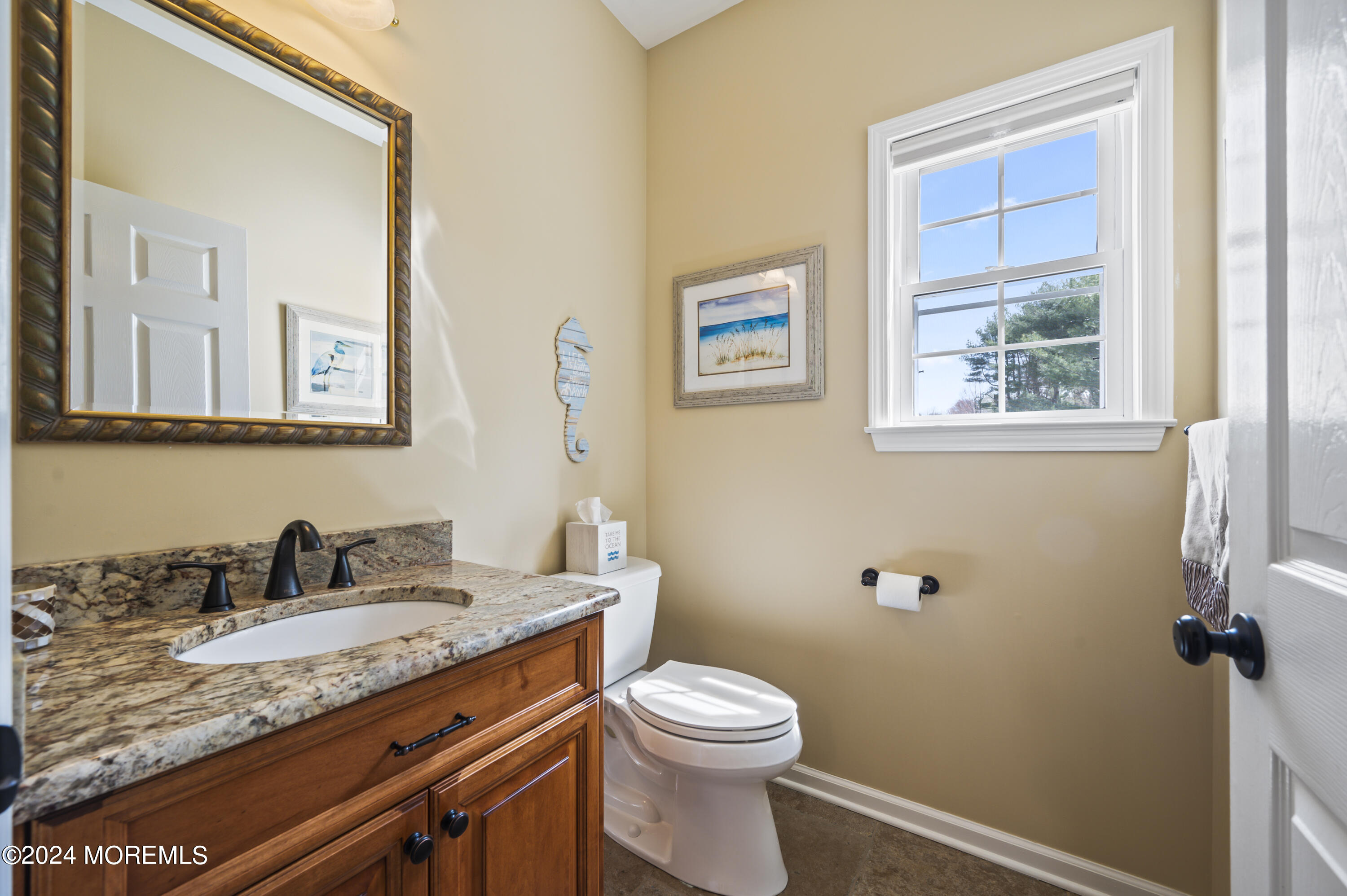 2805 Newman Way Wall, NJ 07719 - Photo 22 of 31 a bathroom with a granite countertop toilet sink and mirror