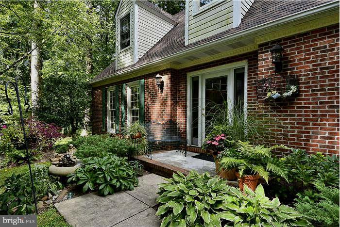 24 Elmridge Road Arnold, MD 21012 - Photo 2 of 30 a view of a house with potted plants