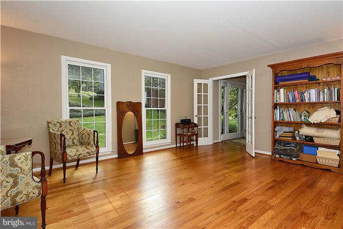 24 Elmridge Road Arnold, MD 21012 - Photo 12 of 30 a living room filled with furniture and a wooden floor