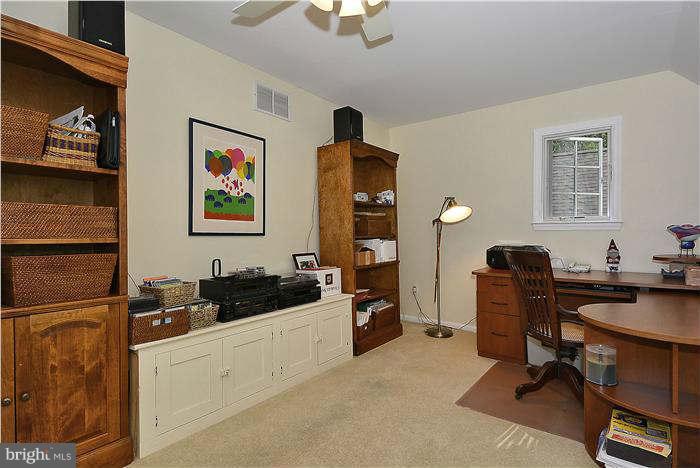 24 Elmridge Road Arnold, MD 21012 - Photo 19 of 30 a view of a workspace with furniture and a window